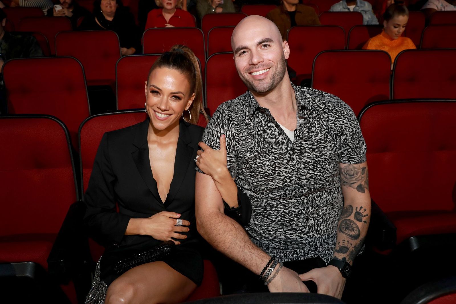 Jana Kramer and Mike Caussin attend the 2019 iHeartRadio Music Awards on March 14, 2019. | Getty Images
