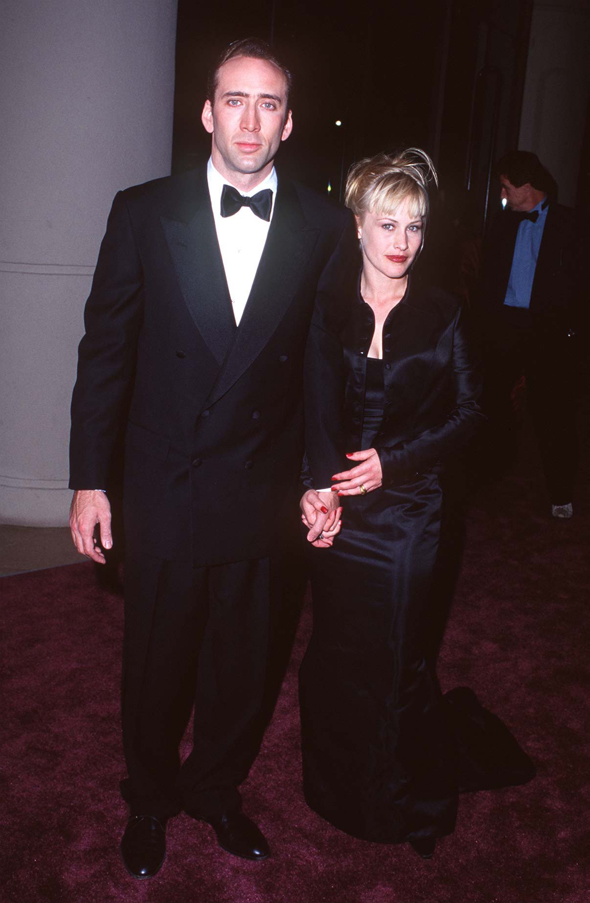 Patricia Arquette and Nicolas Cage during American Film Institute Honors Clint Eastwood with 1996 Life Achievement Award at Beverly Hilton Hotel in Beverly Hills, California. / Source: Getty Images