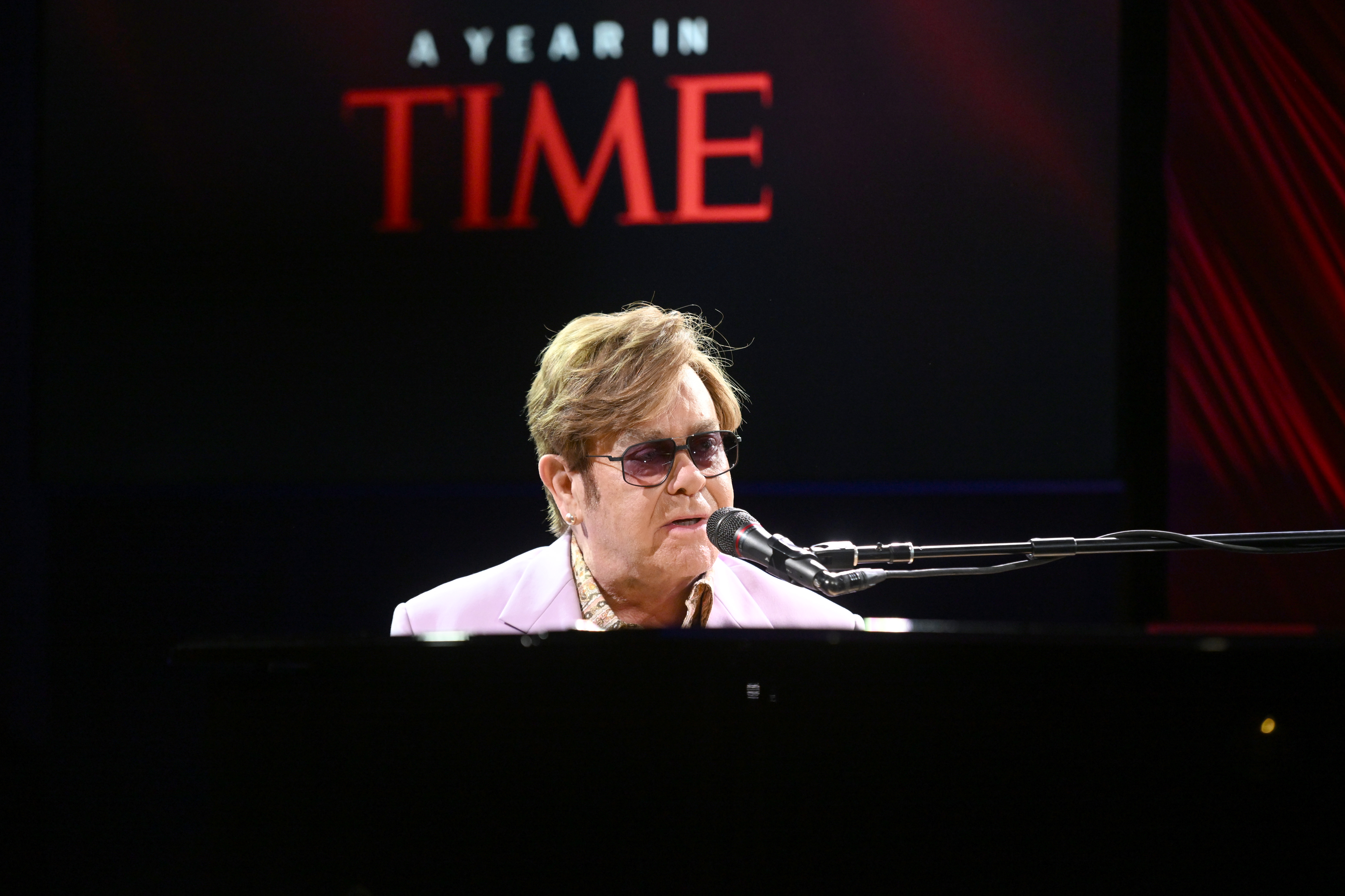 Sir Elton John onstage during the 2024 A Year in TIME dinner on December 11 in New York. | Source: Getty Images