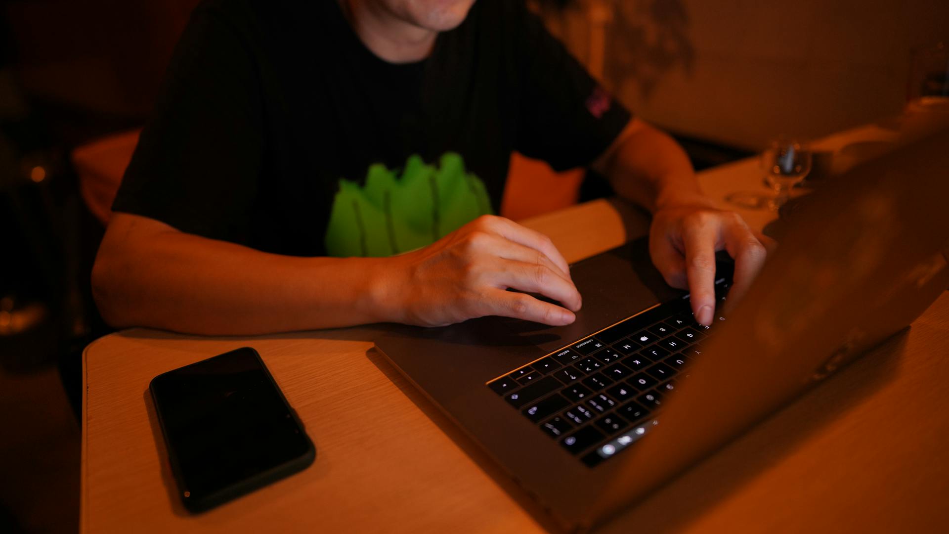 A man sitting with his laptop 