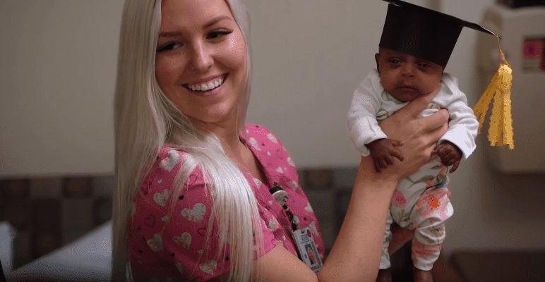 Saybie posing with a nurse | Photo: Sharp HealthCare