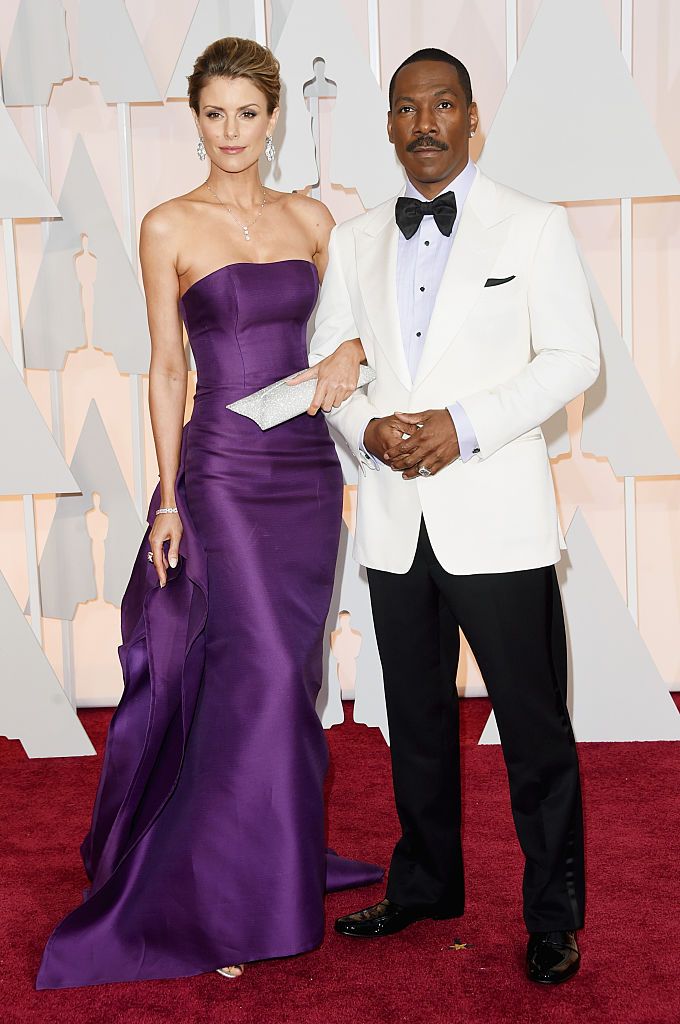 Eddie Murphy and Paige Butcher at the 87th Annual Academy Awards in 2015 in Hollywood | Source: Getty Images
