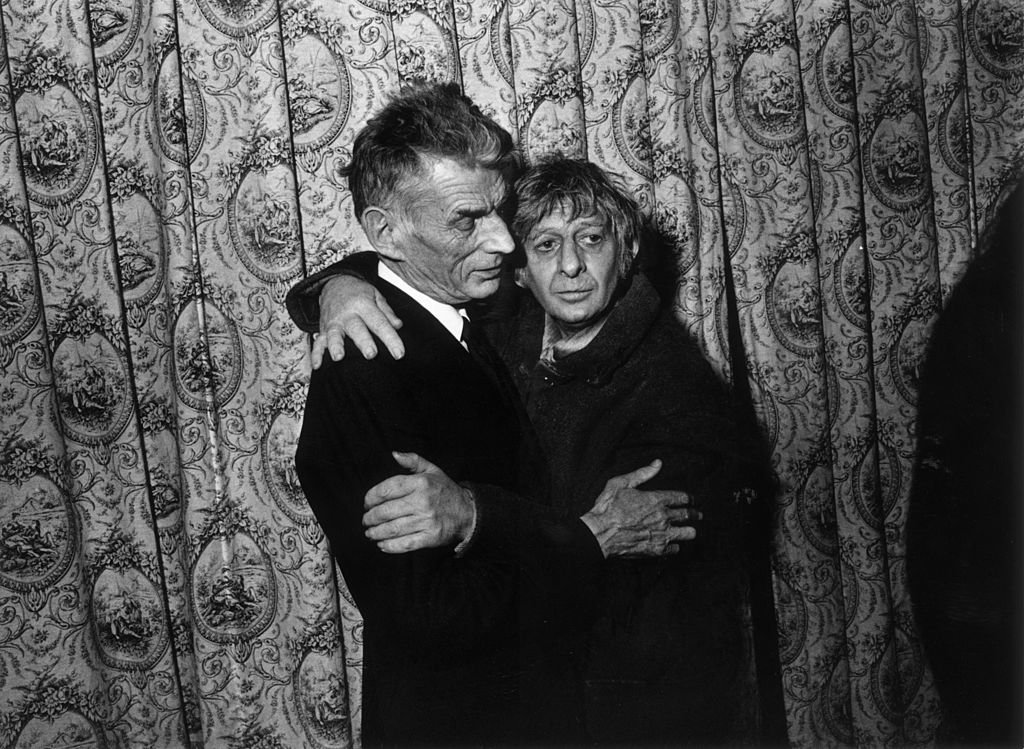 Playwright Samuel Beckett (1906 - 1989) embracing actor Jack MacGowran at a first night performance | Getty Images