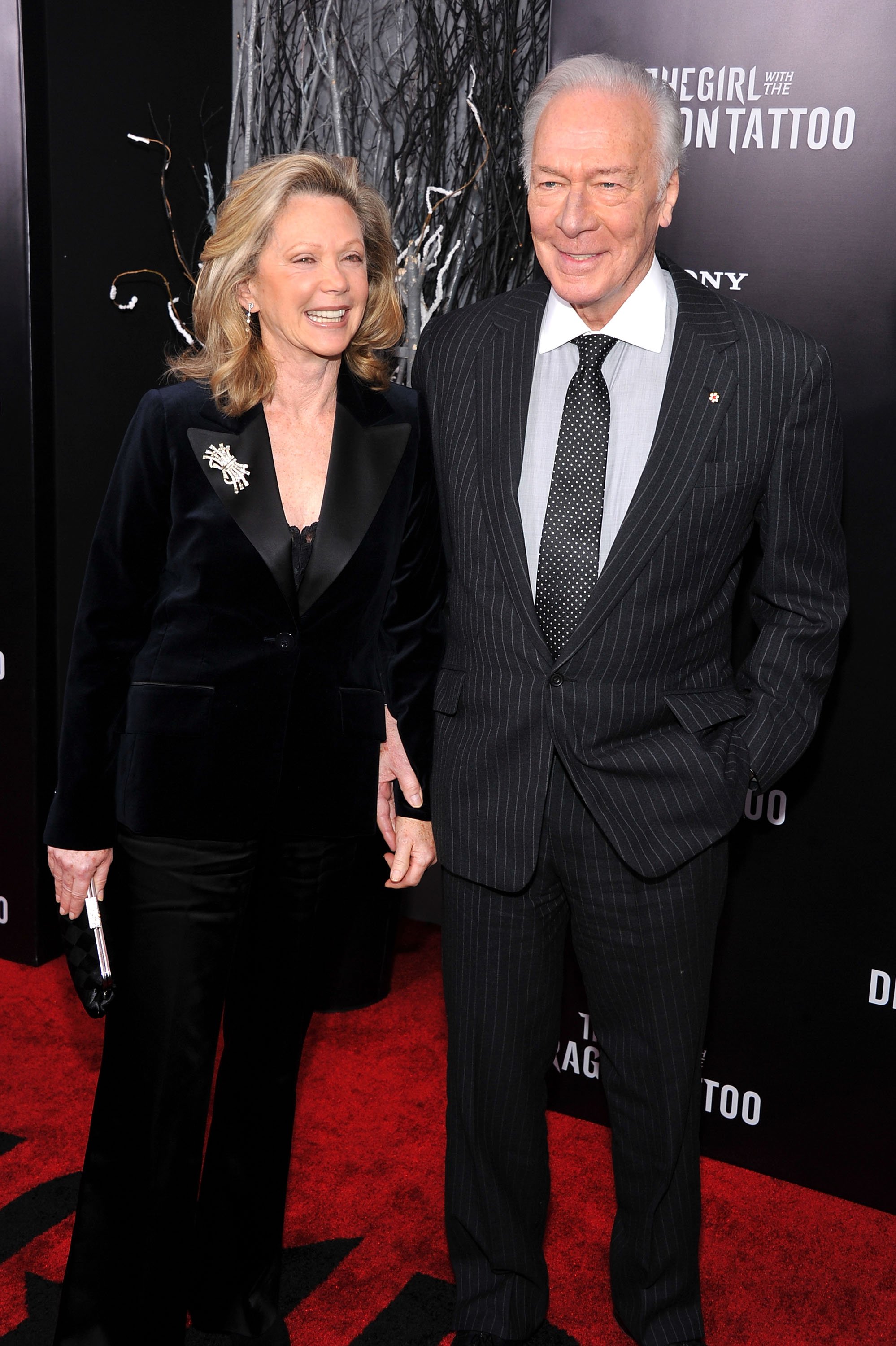 Elaine Taylor and Christopher Plummer pose on the red carpet at "The Girl With the Dragon Tattoo" New York premiere at Ziegfeld Theater on December 14, 2011, in New York City. | Source: Getty Images