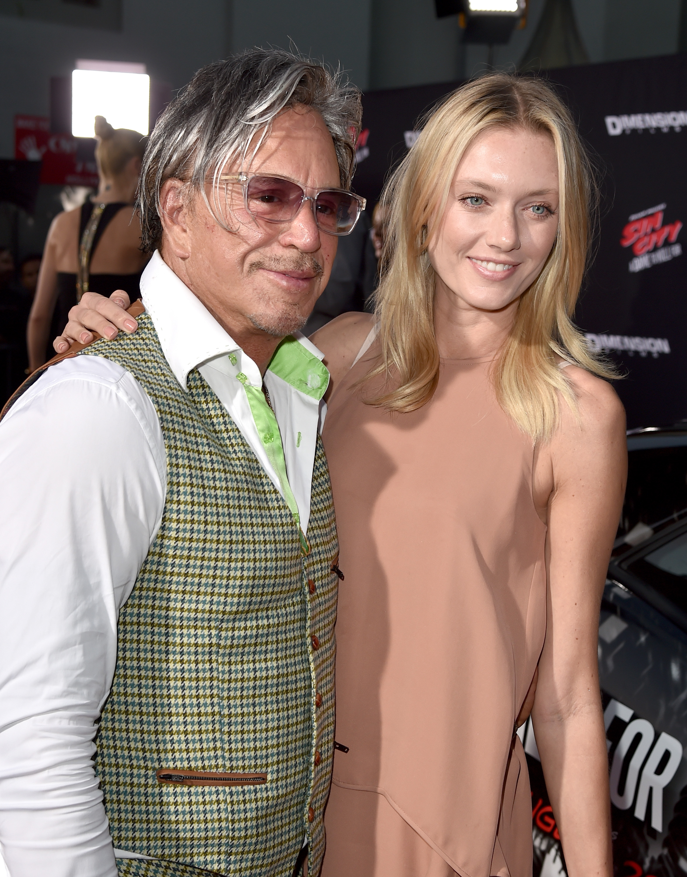 Mickey Rourke and model Anastassija Makarenko at the premiere of "Sin City: A Dame To Kill For," 2014 | Source: Getty Images