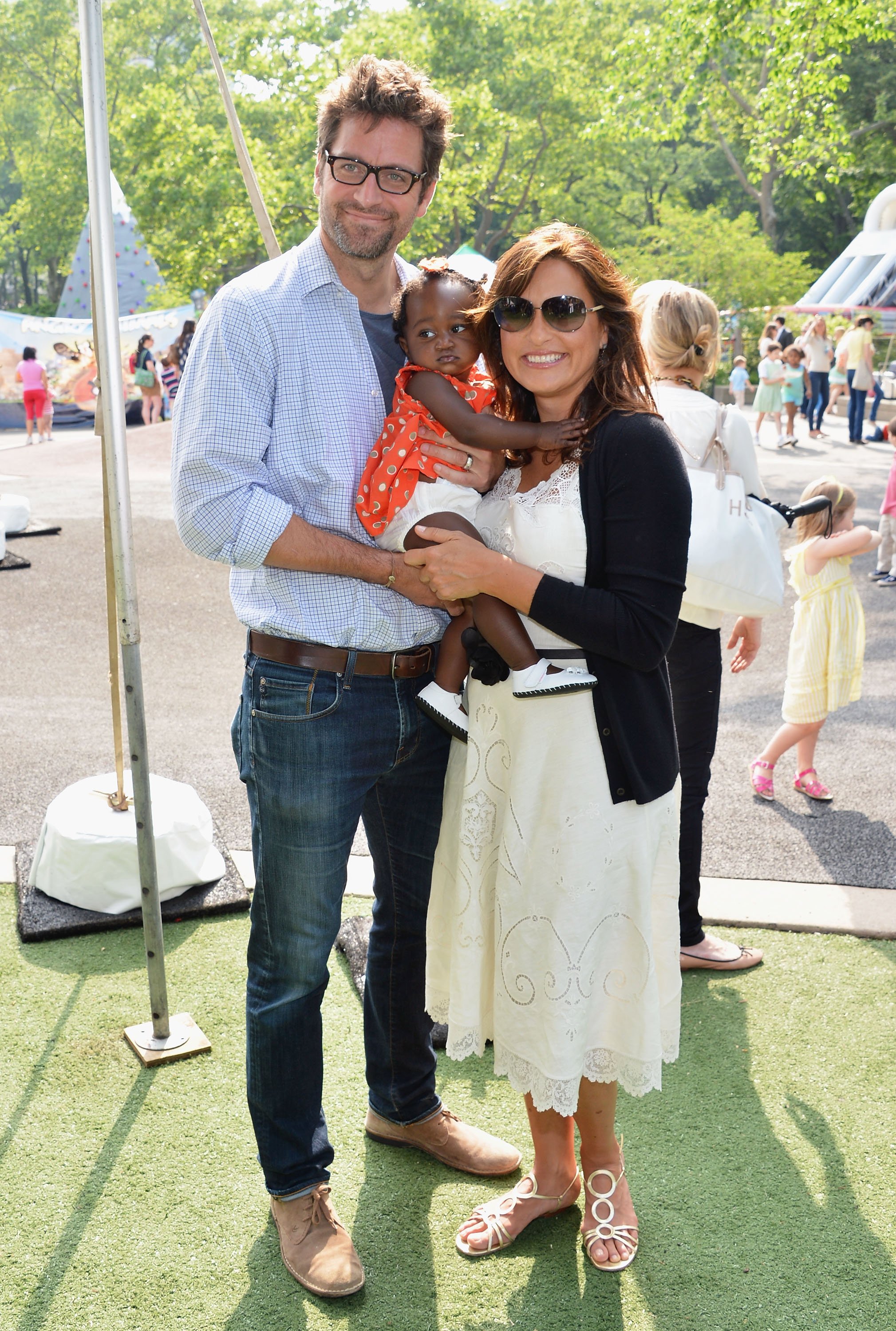  Peter Hermann and Mariska Hargitay with their daughter, Amaya at the 20th Annual Playground Partners Family Party at Central Park, Heckscher Softball Fields on May 23, 2012. | Source: Getty Images