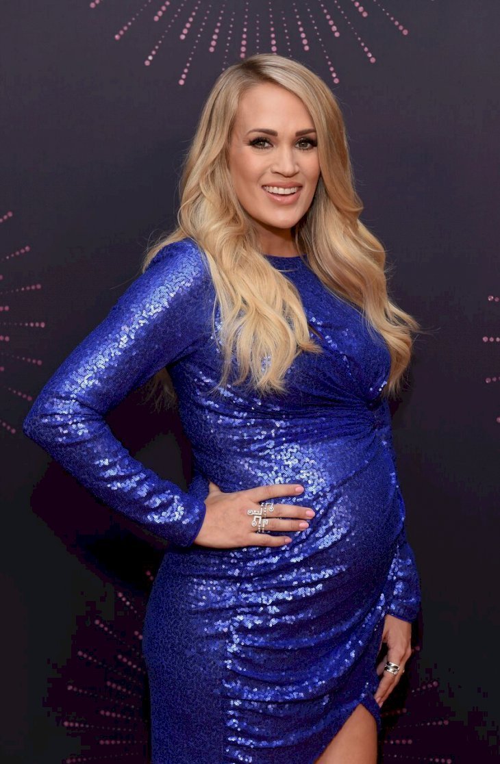 Pregnant Carrie Underwood Flaunts Two Elegant Glittery Dresses At Cmt Artist Of The Year Awards