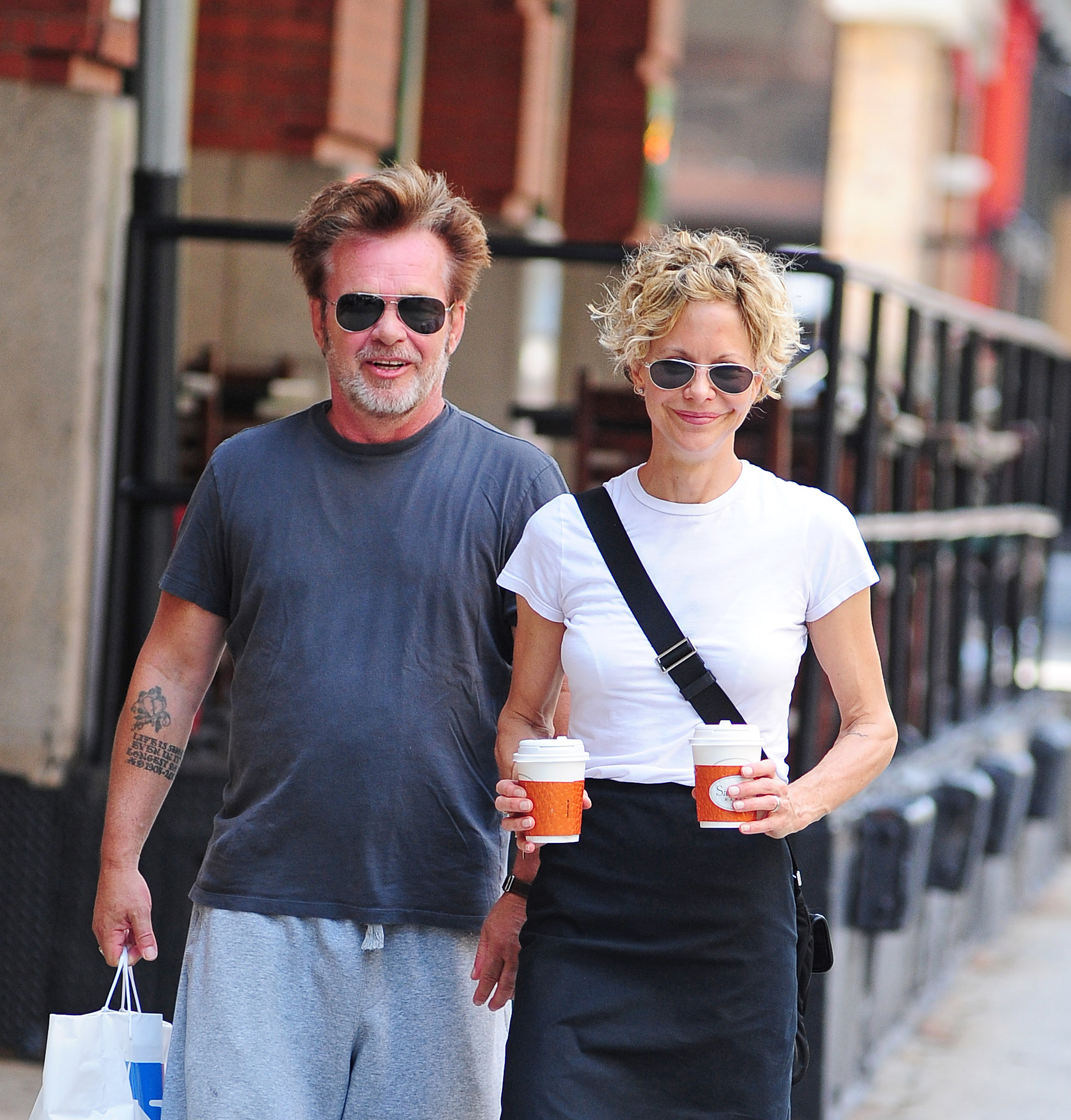 John Cougar Mellencamp and Meg Ryan seen on June 24, 2013, in New York City | Source: Getty Images