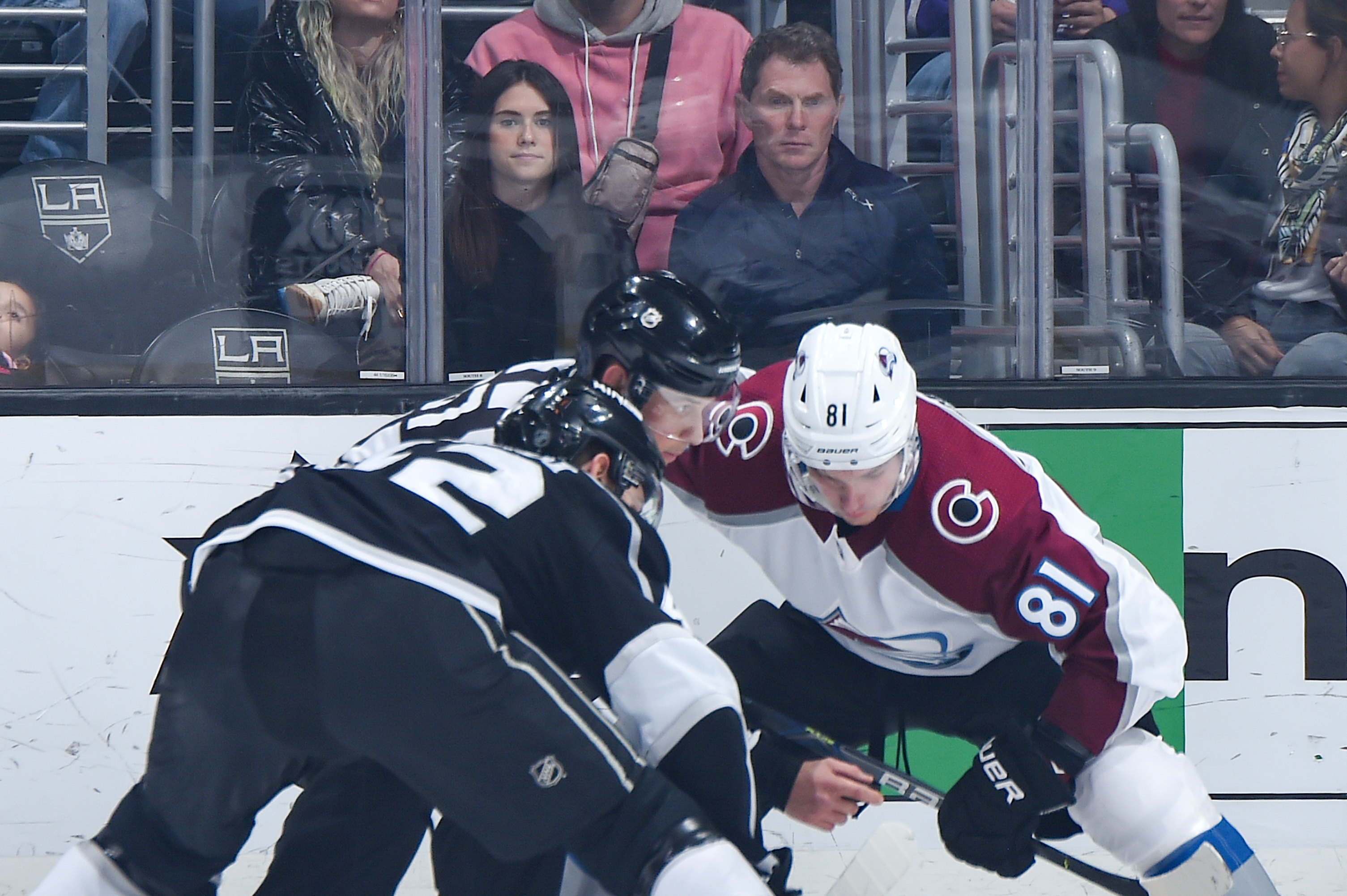 Chef Bobby Flay (L) and his daughter Sophie Flay (R) watch the Los Angeles Kings game against the Colorado Avalanche at STAPLES Center on March 9, 2020, in Los Angeles, California. | Source: Getty Images