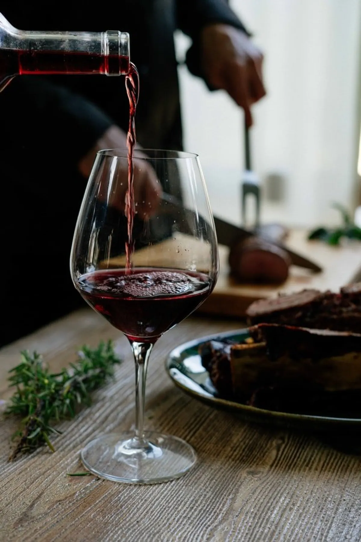 Pour a glass of red wine. | Source: Unsplash