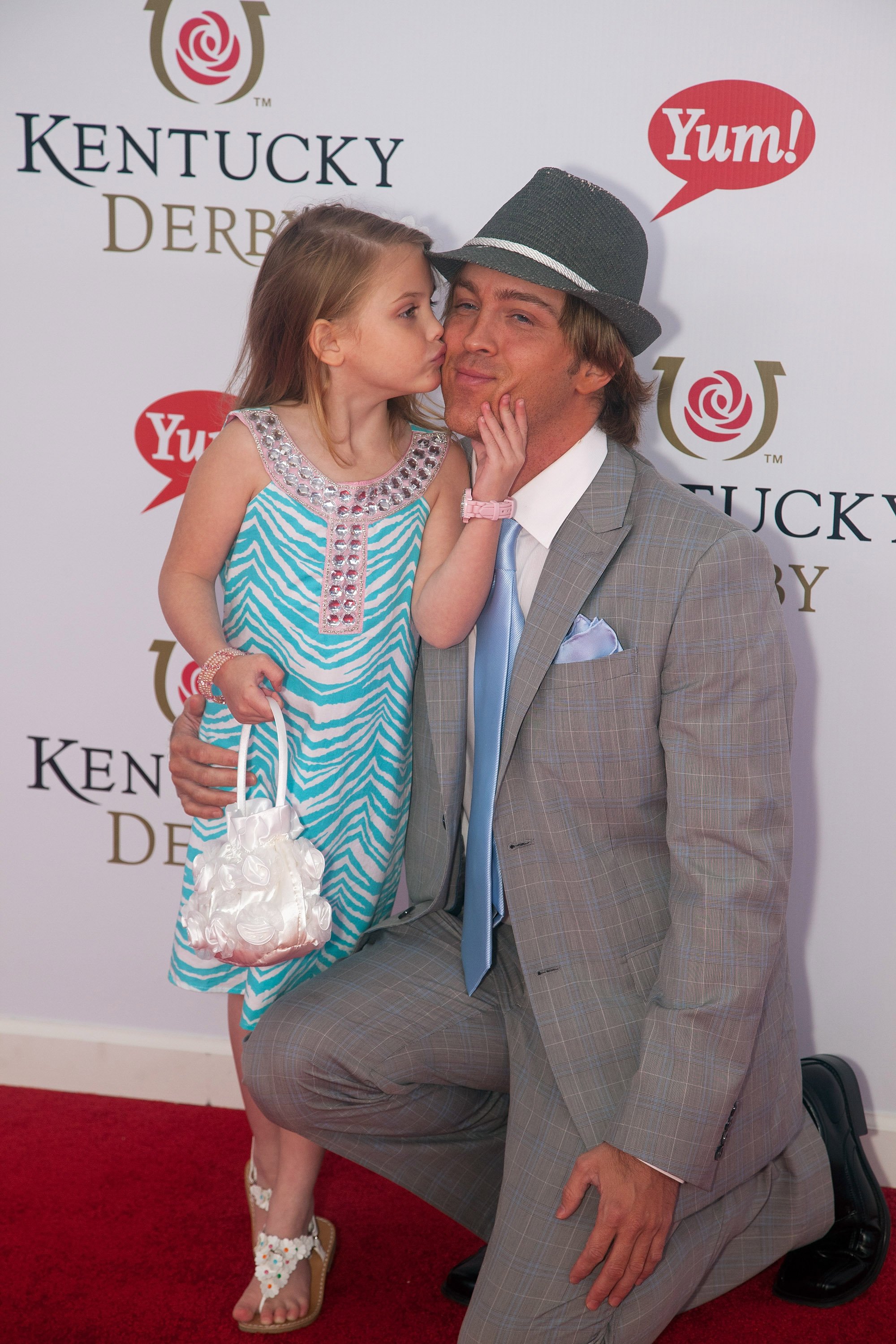 Dannielynn and Larry Birkhead during the 137th Kentucky Derby at Churchill Downs on May 7, 2011, in Louisville, Kentucky | Source: Getty Images