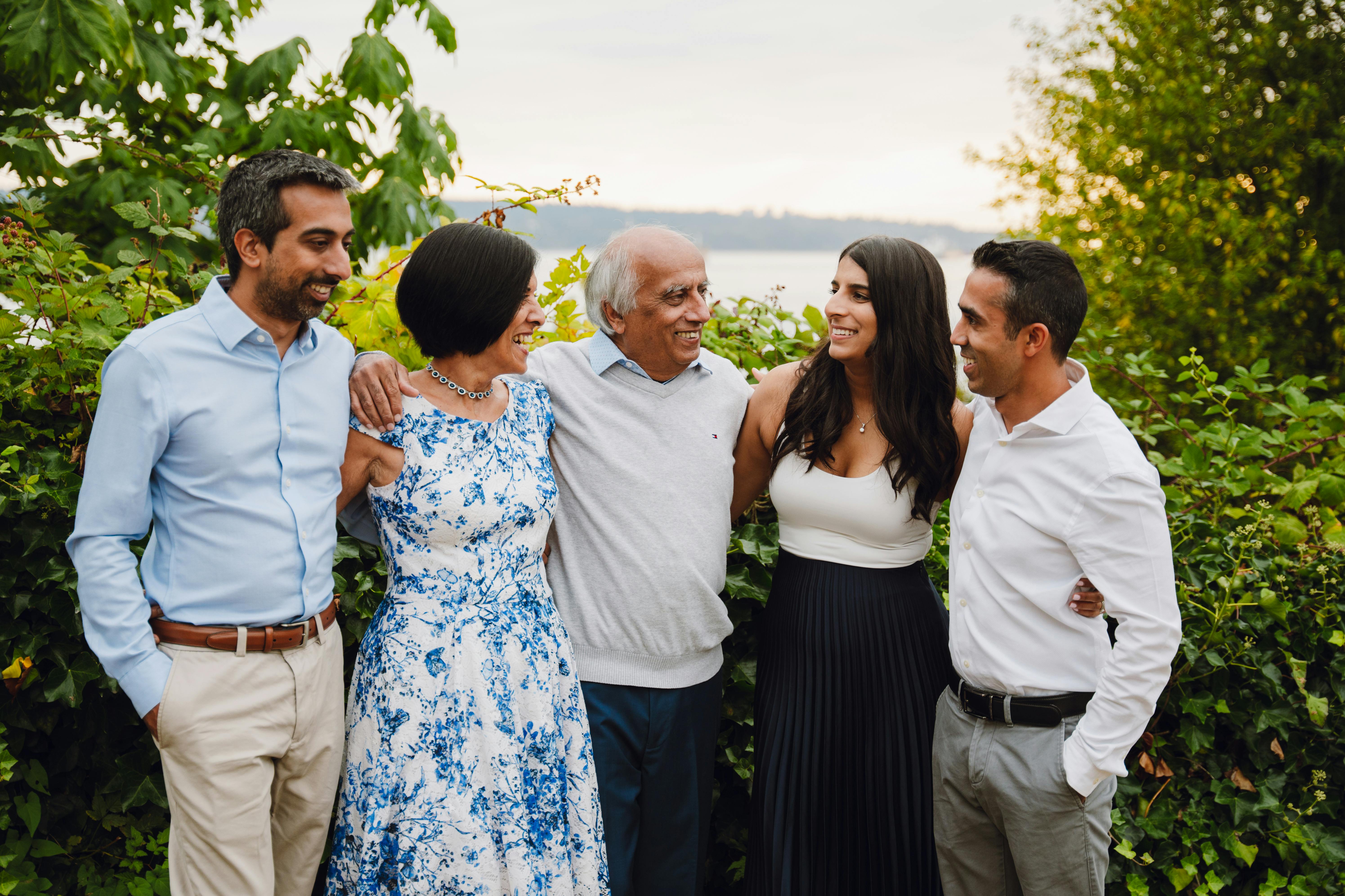 A happy family embracing while gathered together | Source: Pexels