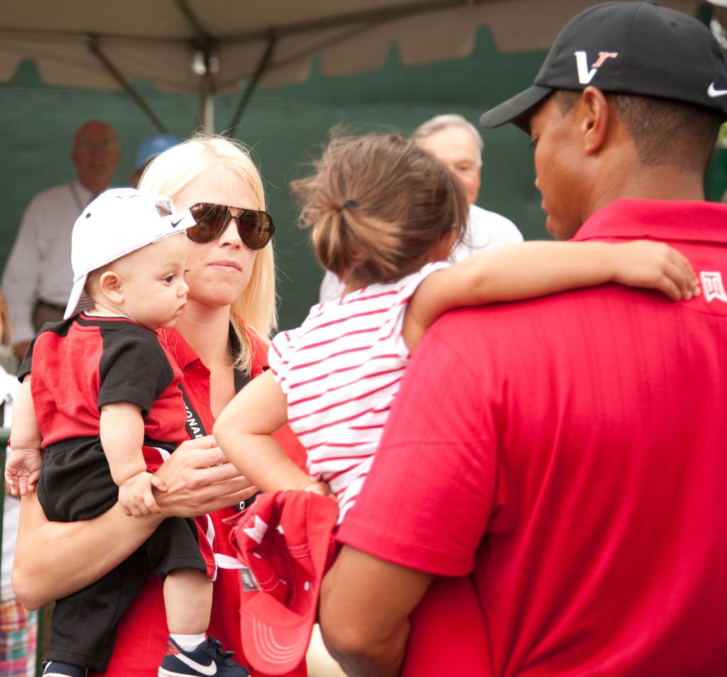 Tiger Woods is greeted by his son Charlie Woods, wife Elin Woods and daughter Sam Woods held at Congressional Country Club on July 5, 2009 in Bethesda, Maryland. | Source: Getty Images