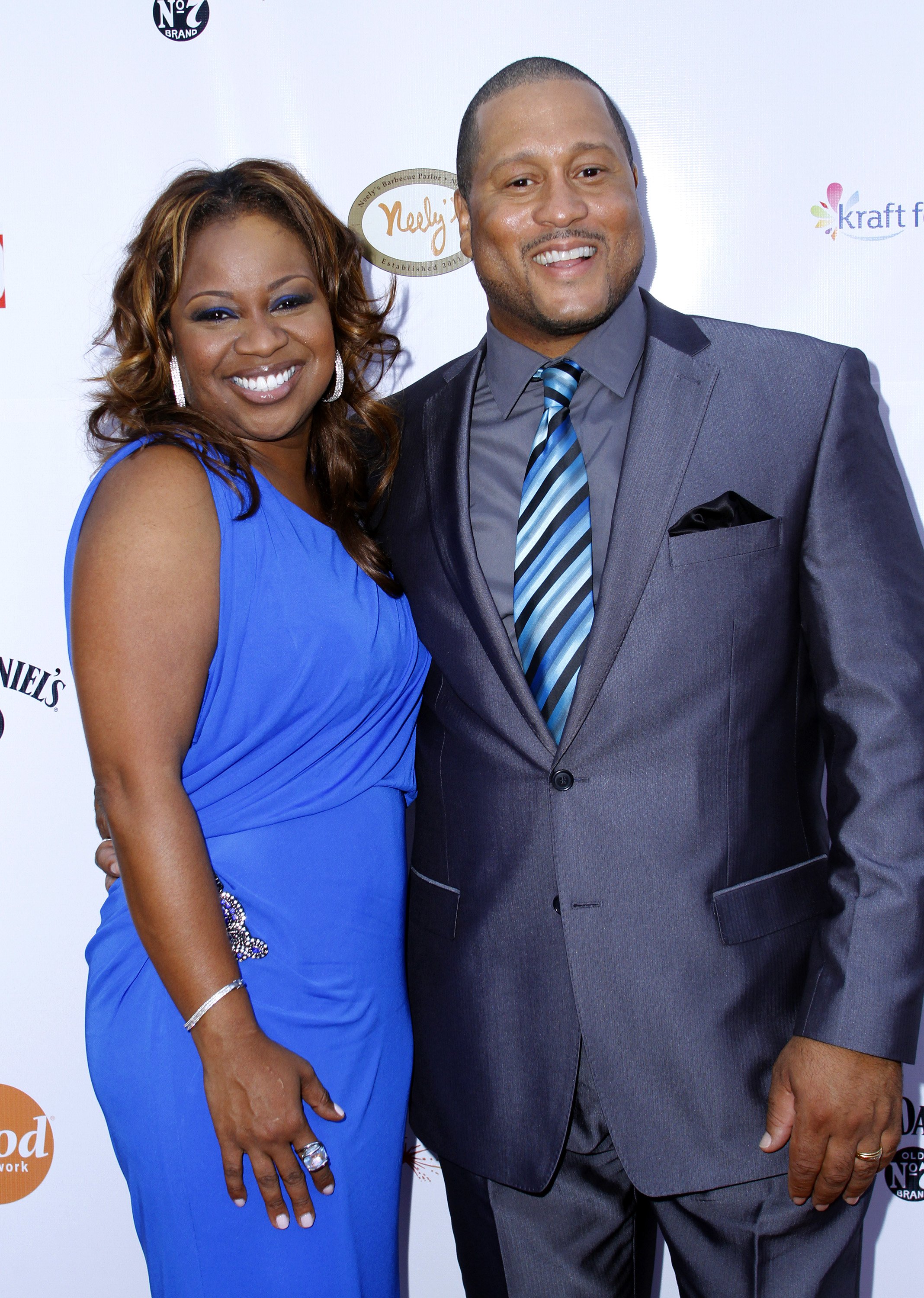 Gina Neely and Pat Neely at the grand opening of Nelly's Barbecue Parlor on July 12, 2011 in New York City. | Source: Getty Images