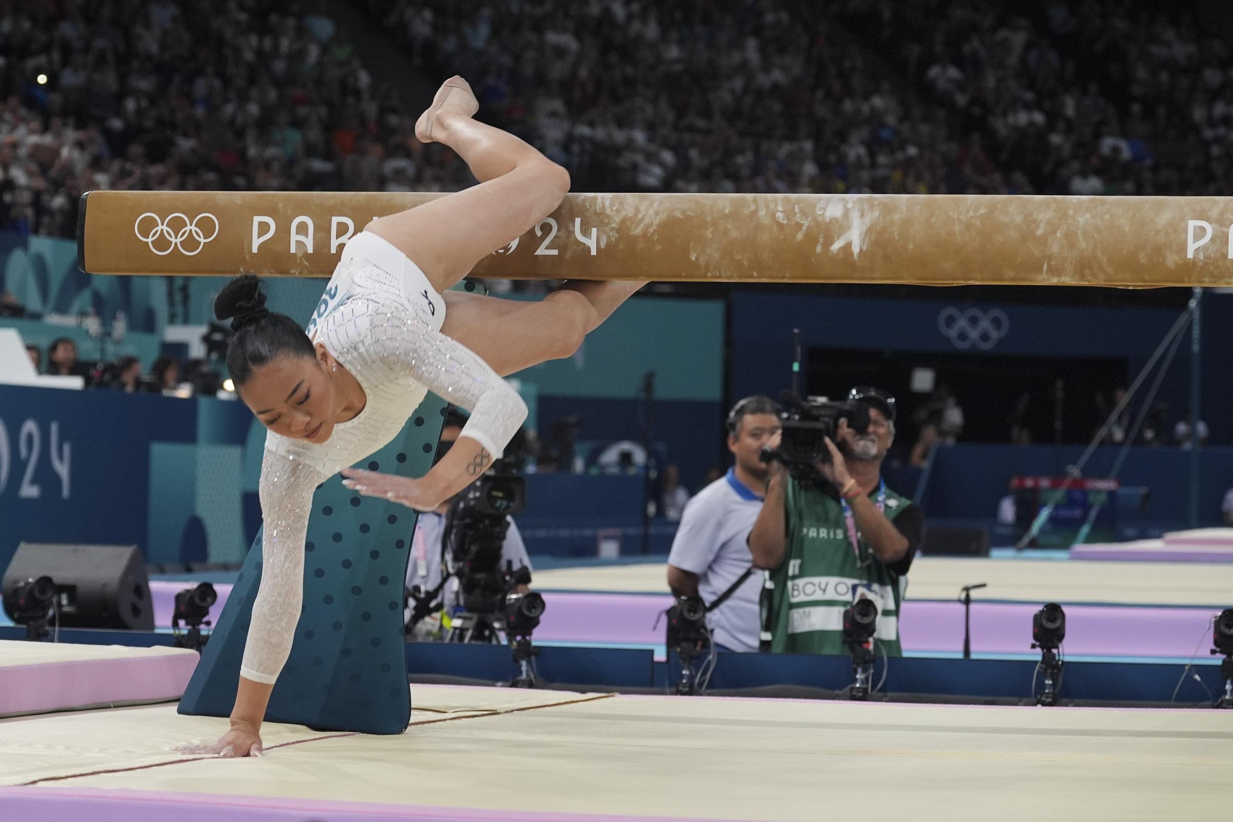 Suni Lee mid-fall on the balancing beam during the Women's Final at the Paris 2024 Olympics on August 5, in France. | Source: Getty Images