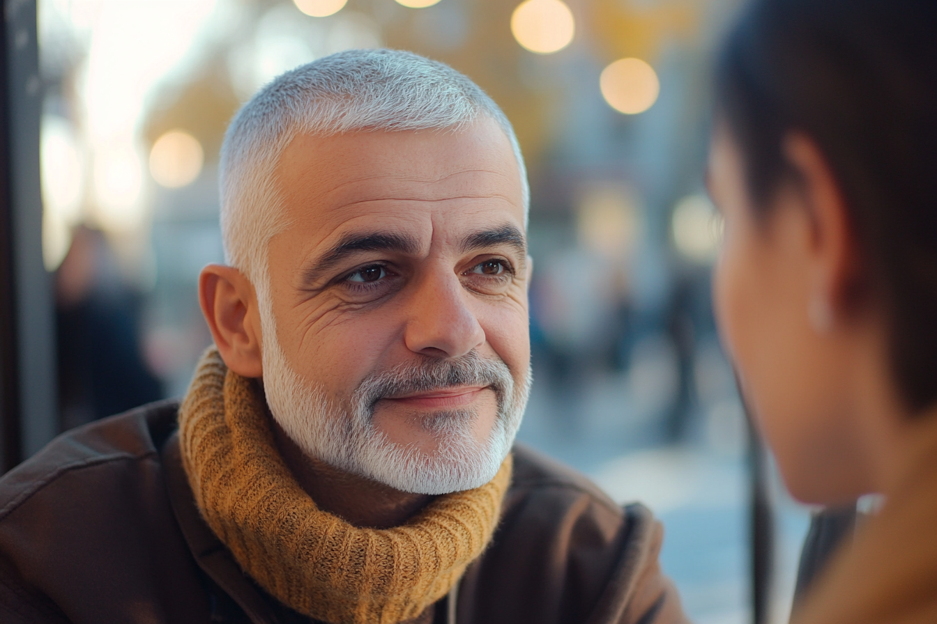 A man talking to a younger woman | Source: Midjourney