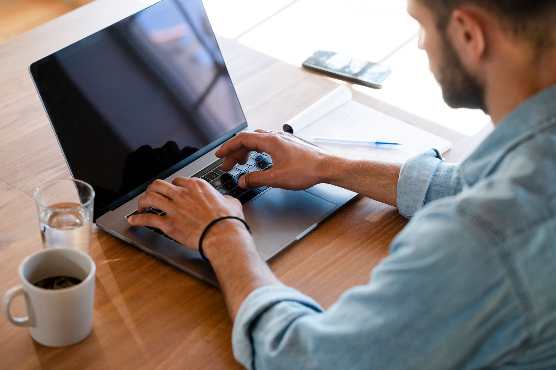 A man working on his laptop. | Source: Shutterstock