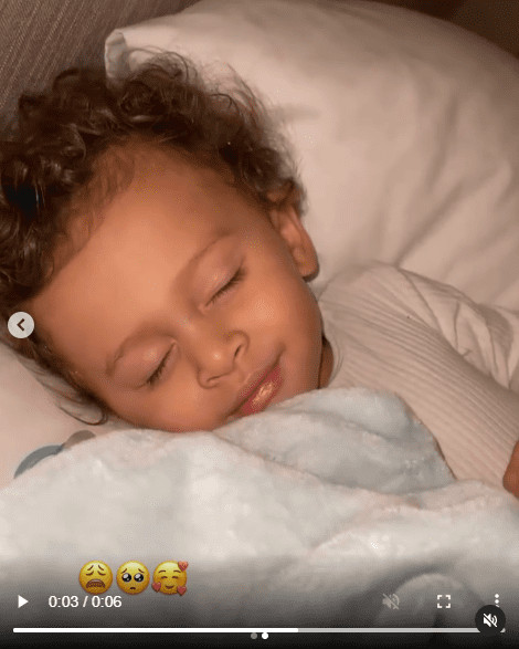 Chris Brown's son Aeko smiles in his sleep | Source: Instagram/ammikaaa
