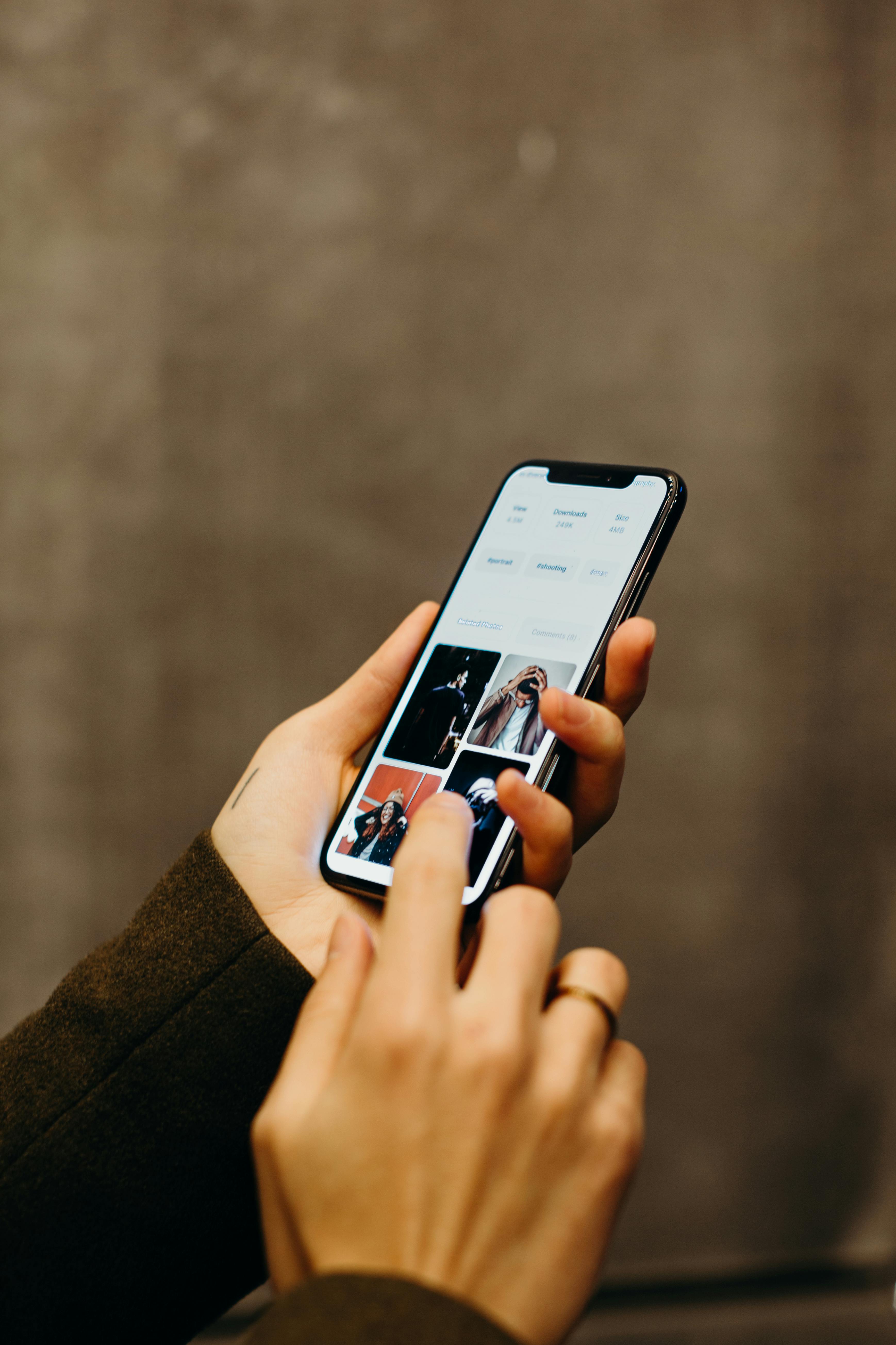 A woman browsing through photos | Source: Pexels