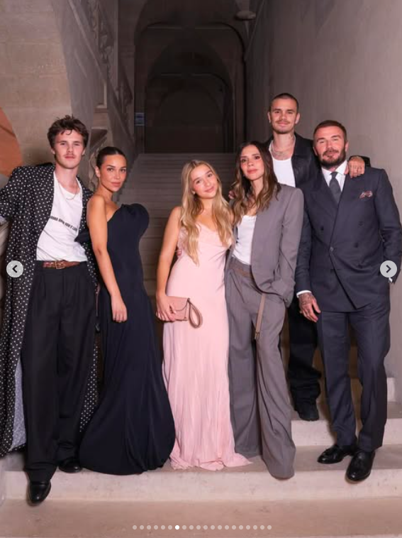 Cruz, Harper, Victoria, Romeo, and David Beckham posing for a photo with Jackie Apostel, posted on October 5, 2025. | Source: Instagram/victoriabeckham