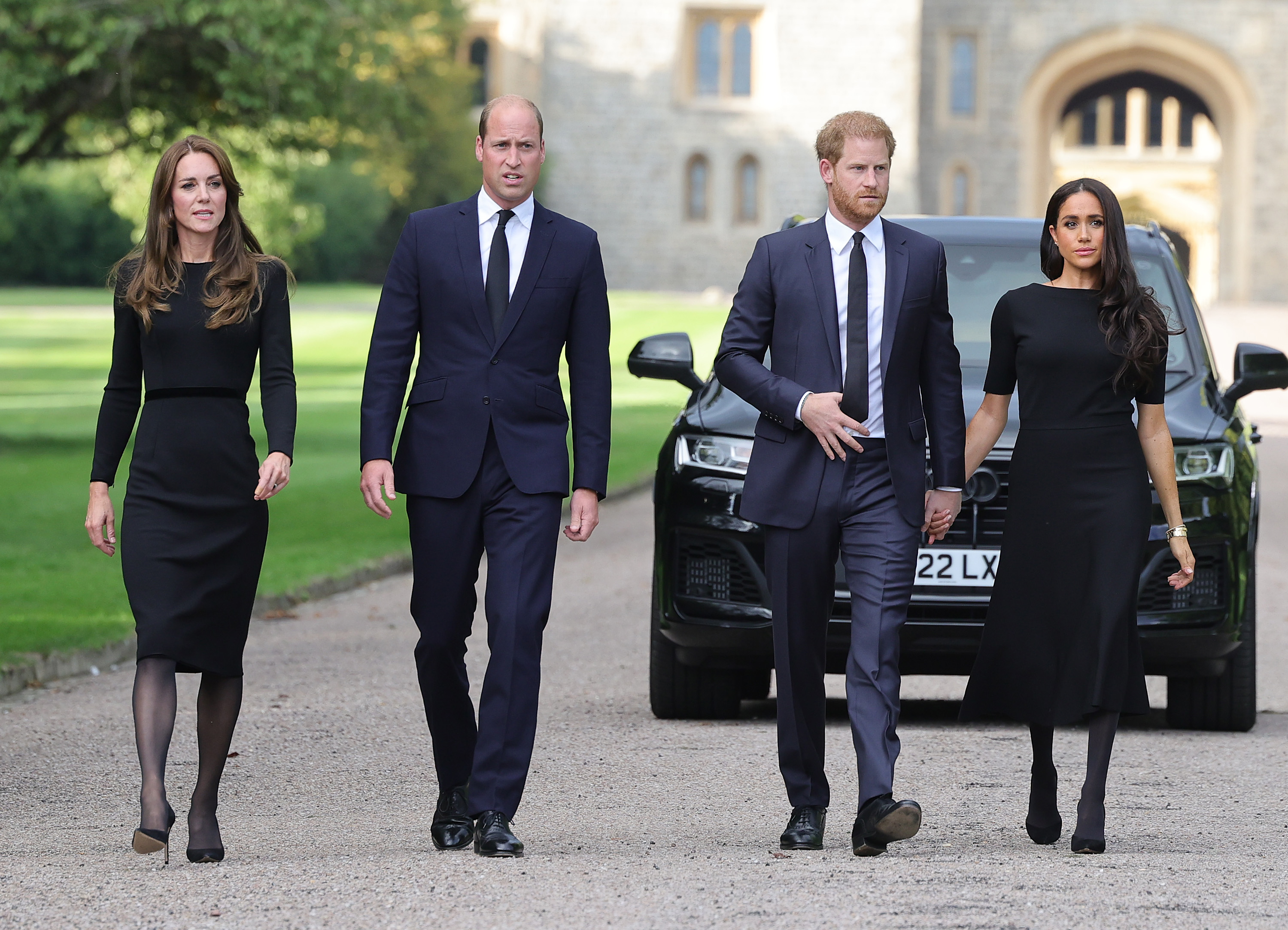 Princess Catherine, Prince William, Prince Harry and Meghan Markle on their way to greet well wishers in Windsor, England on September 10, 2022 | Source: Getty Images