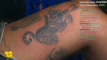 A tiger tattoo inspired by Wiz Khalifa's Muay Thai journey is shown after being completed by tattoo artist Kimmy Tan. | Source: TikTok/Kimmy Tan