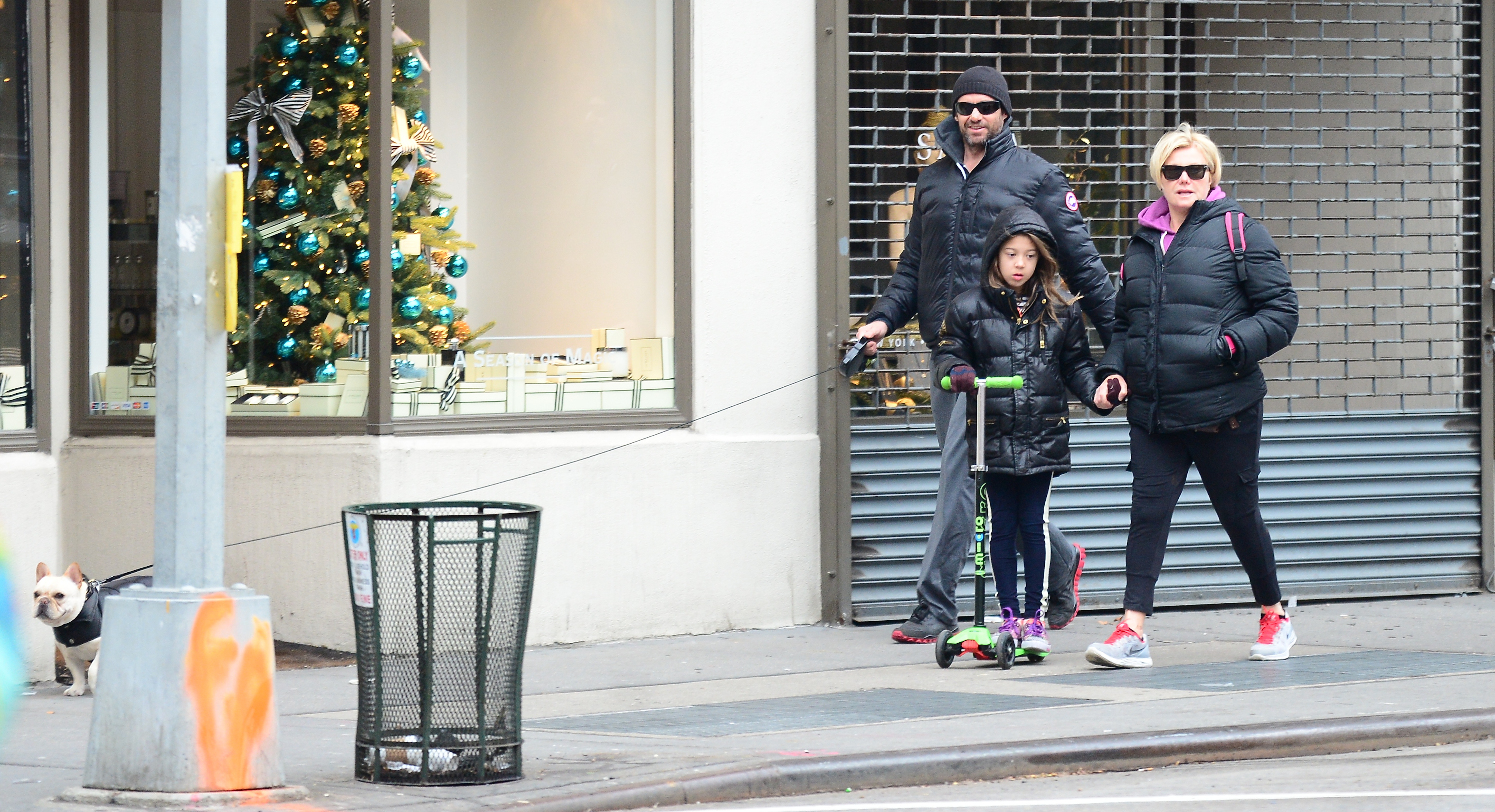 Hugh Jackman, Ava Jackman, and Deborra-Lee Furness in West Village in New York City on December 2, 2013 | Source: Getty Images