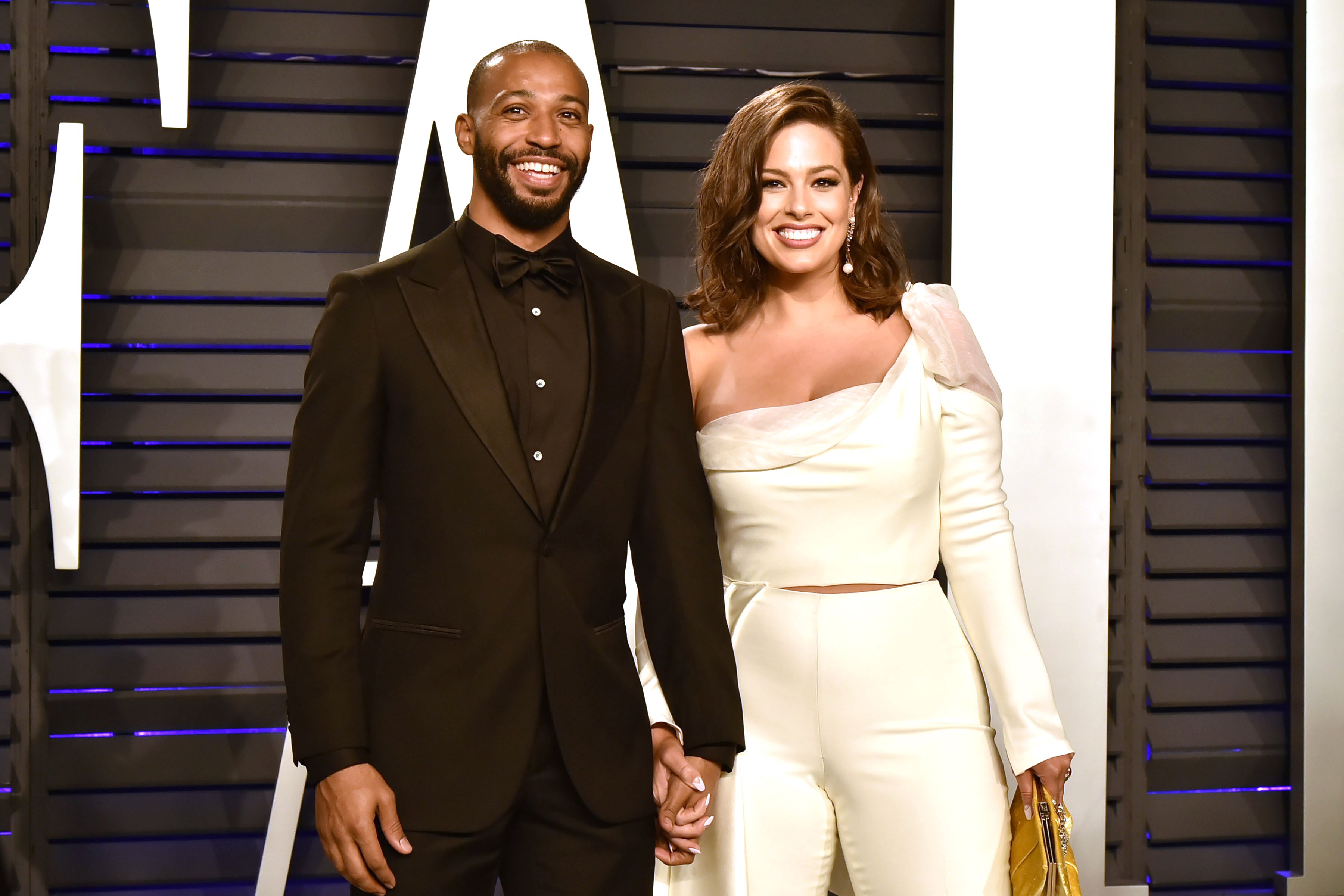 Justin Ervin and Ashley Graham attend the 2019 Vanity Fair Oscar Party on February 24, 2019, in Beverly Hills, California | Photo: Getty Images