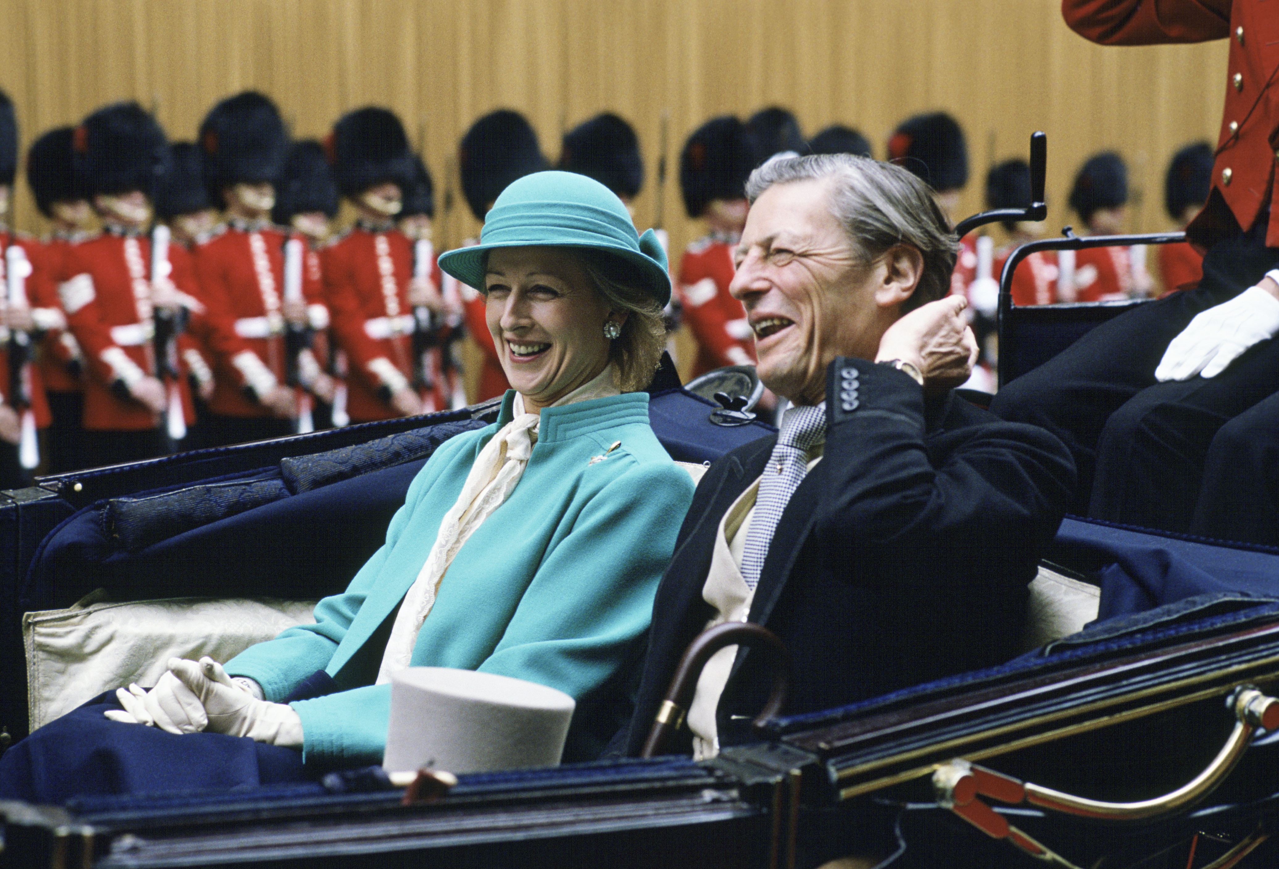 Caught in a rare moment of levity, Princess Alexandra shares a warm laugh with her husband, Sir Angus Ogilvy, during their Mexican state visit on 11 June 1985. Smiling from their royal carriage, the couple exudes ease and intimacy amid all the pomp and pageantry.