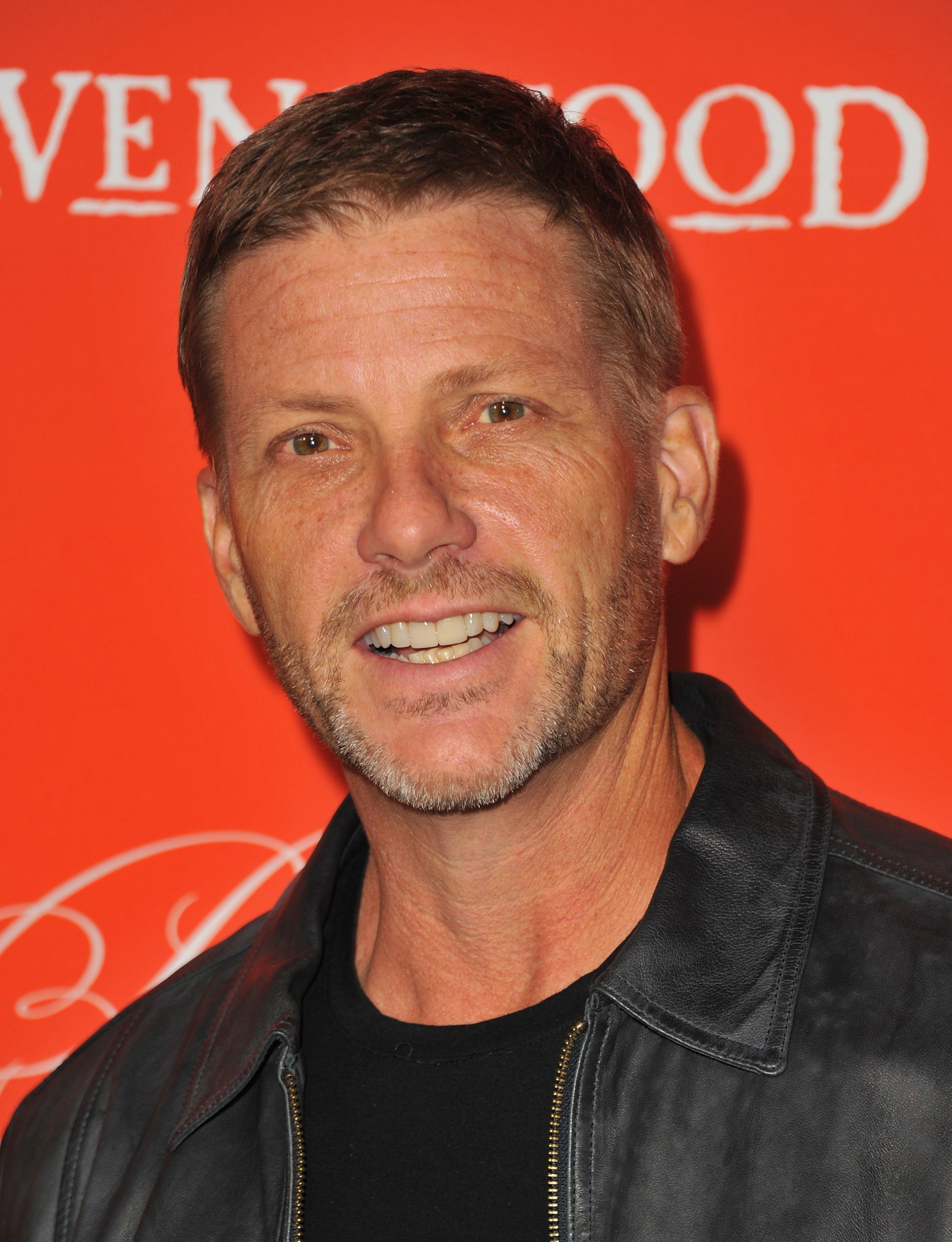  Doug Savant attends a screening of ABC Family's "Pretty Little Liars" Halloween episode at Hollywood Forever Cemetery on October 15, 2013, in Hollywood, California. | Source: Getty Images.