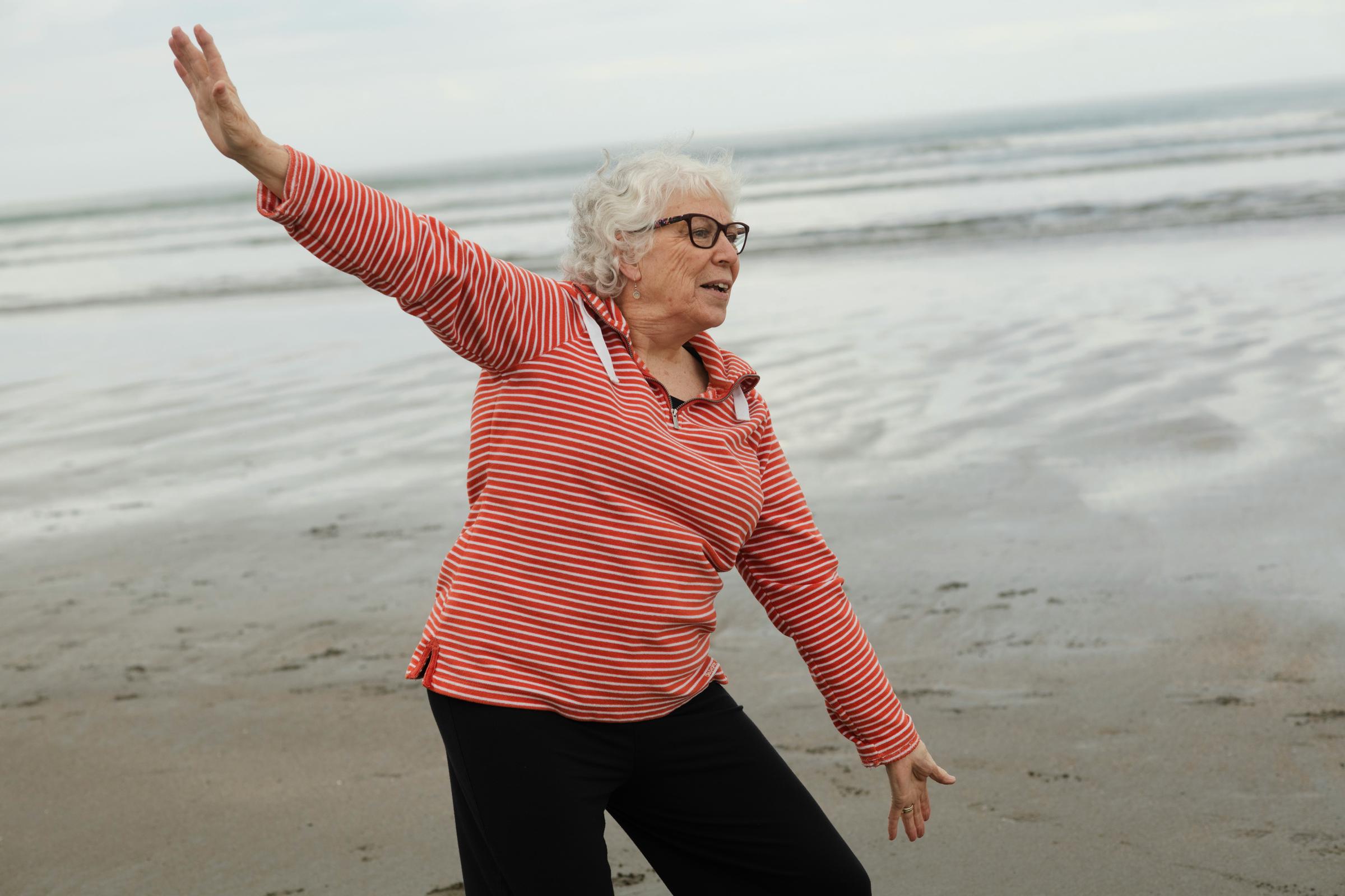 An elderly woman in a good mood | Source: Unsplash