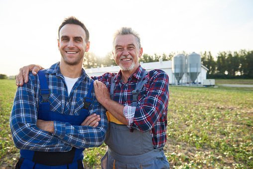 A father and son proud of their farm | Photo: Getty Images