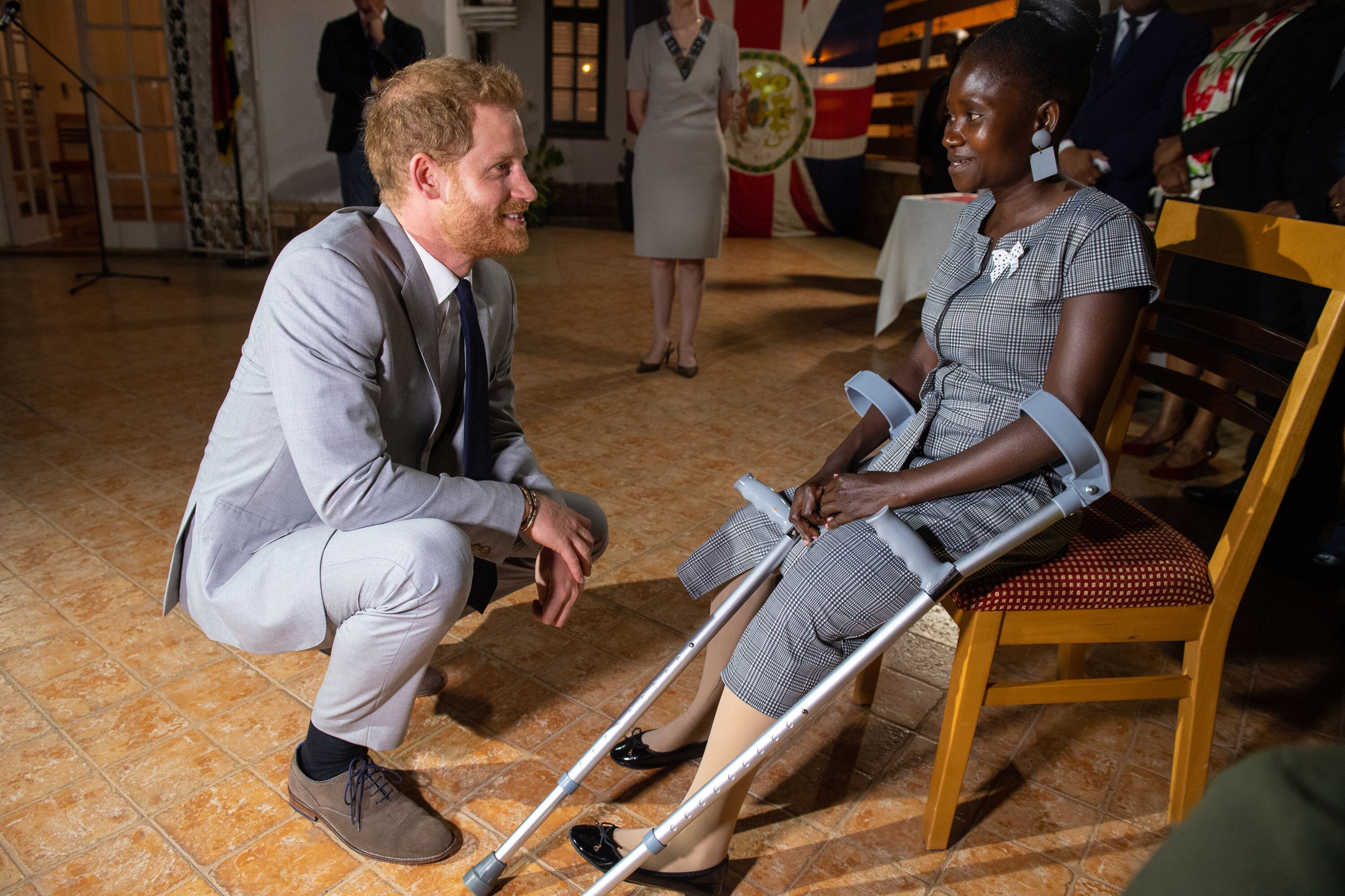Prince Harry meets landmine victim Sandra Tigica. | Source: Getty Images