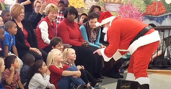  Captain Josh Risher dressed as Santa Claus to surprise his daughters, Christy and Kaylee | Photo: Youtube/thestate