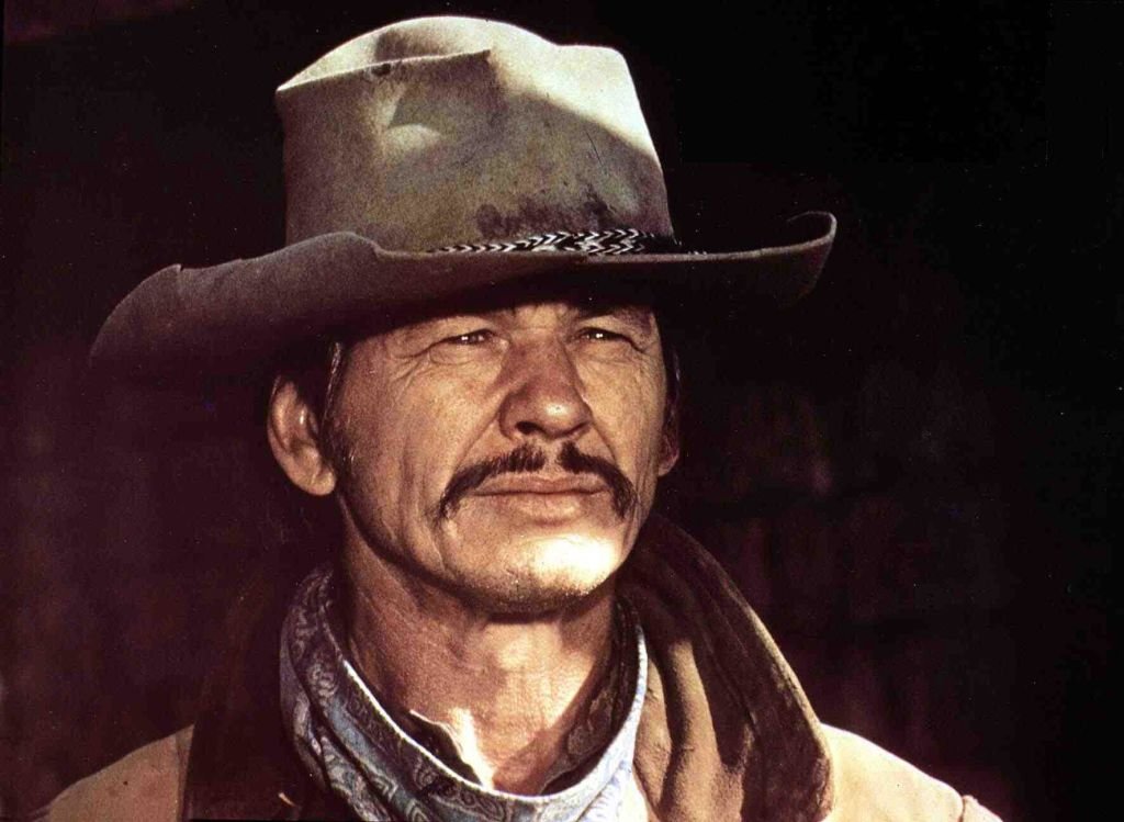 Charles Bronson as Chino Valdez is a horse breeder in the film "Chino" in 1976. / Source: Getty Images
