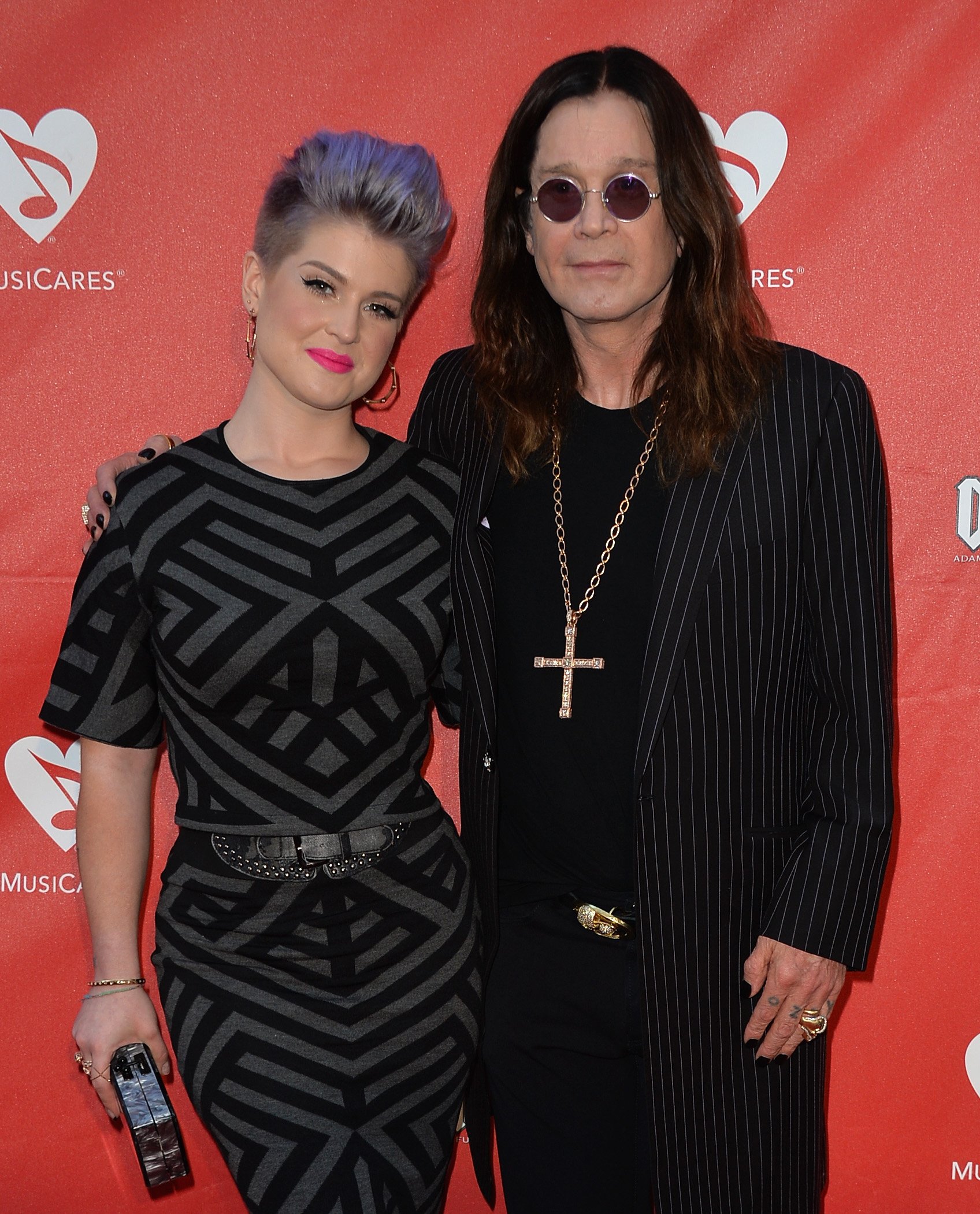 Kelly Osbourne with father Ozzy Osbourne during the 2014 Annual MusiCares MAP Fund Benefit Concert in Los Angeles California. | Photo: Getty Images