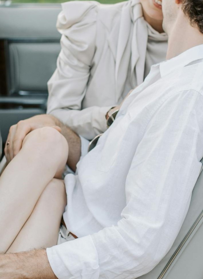 Close-up of a woman sitting on a man's lap | Source: Pexels