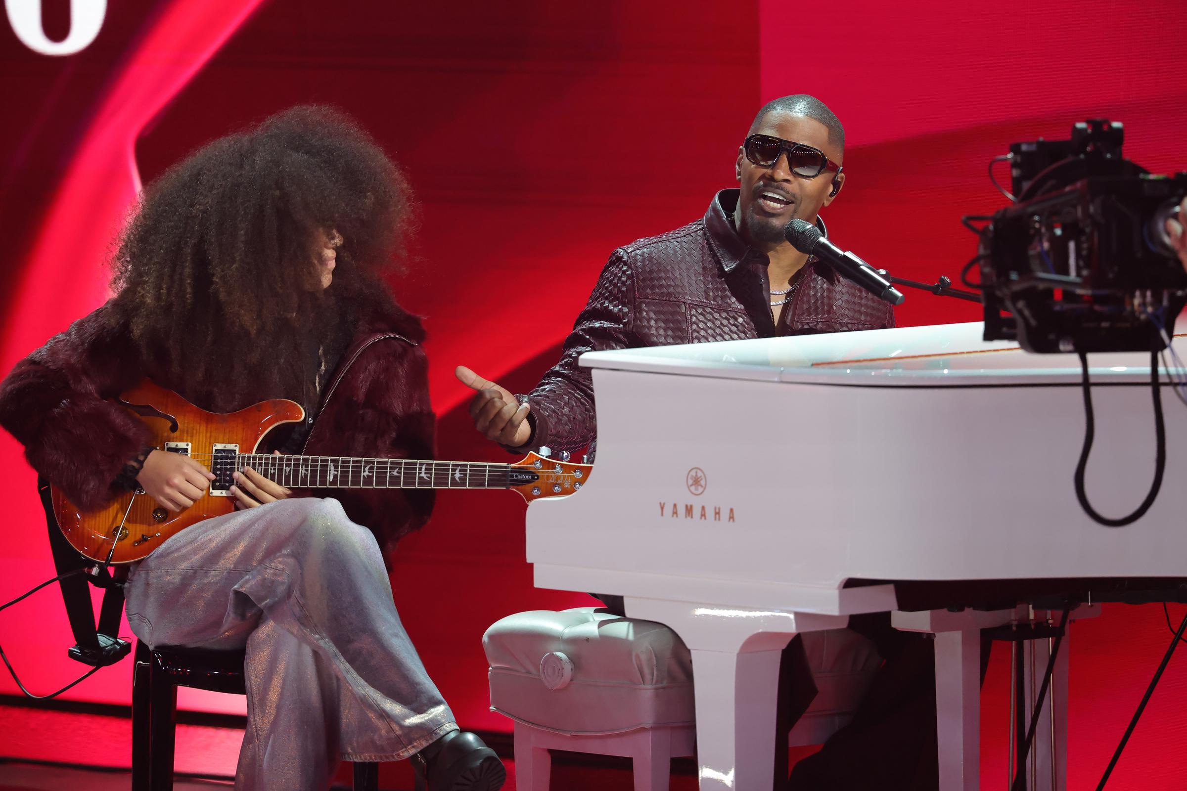 Anelise's guitar performance carried extra emotional weight because Foxx has previously credited her music with helping him during his medical crisis. Their duet turned the awards stage into a reminder of the bond they share beyond the spotlight. | Source: Getty Images
