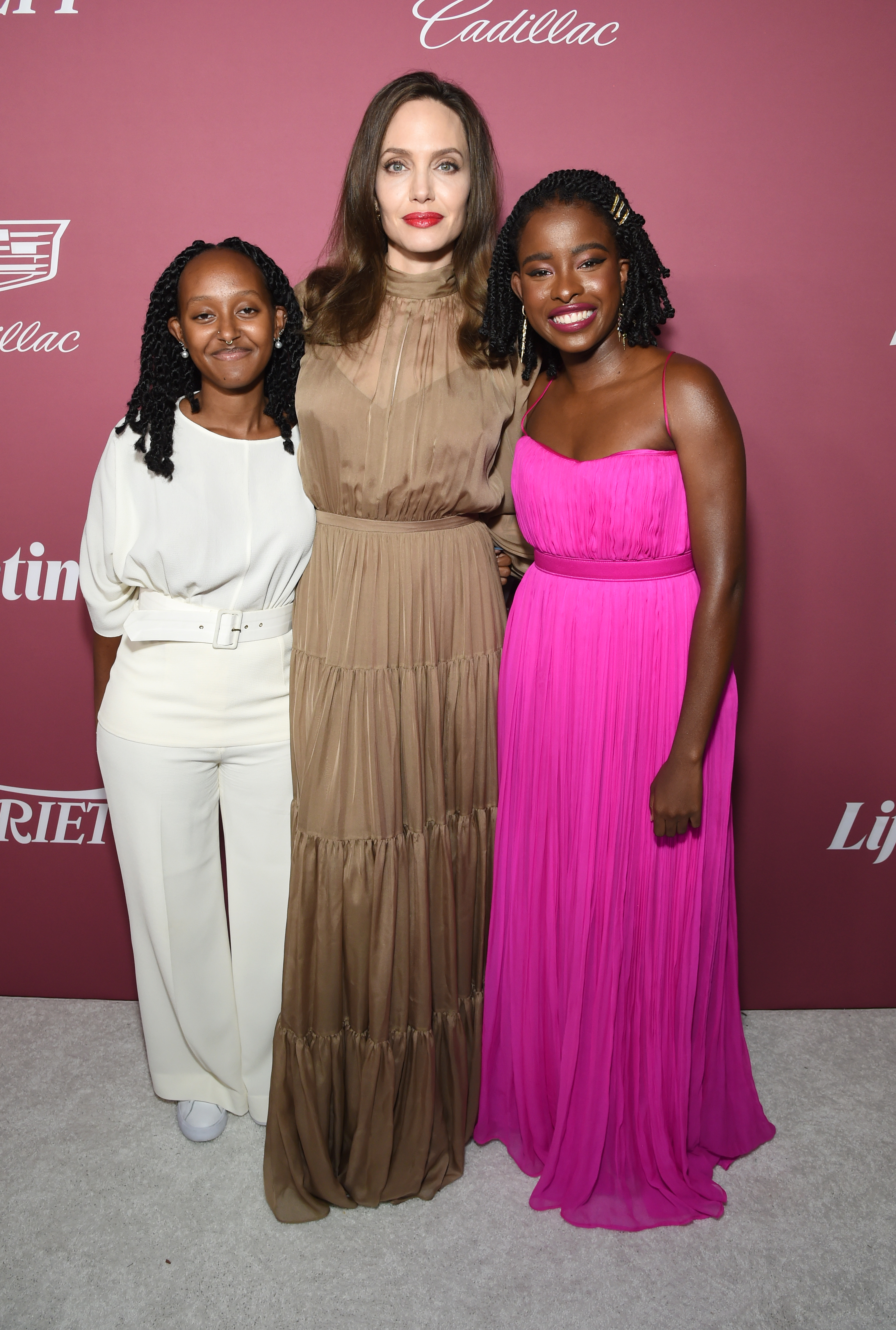 Zahara Jolie-Pitt, Angelina Jolie, and Amanda Gormon attend Variety's Power of Women on September 30, 2021 in Los Angeles, California. | Source: Getty Images