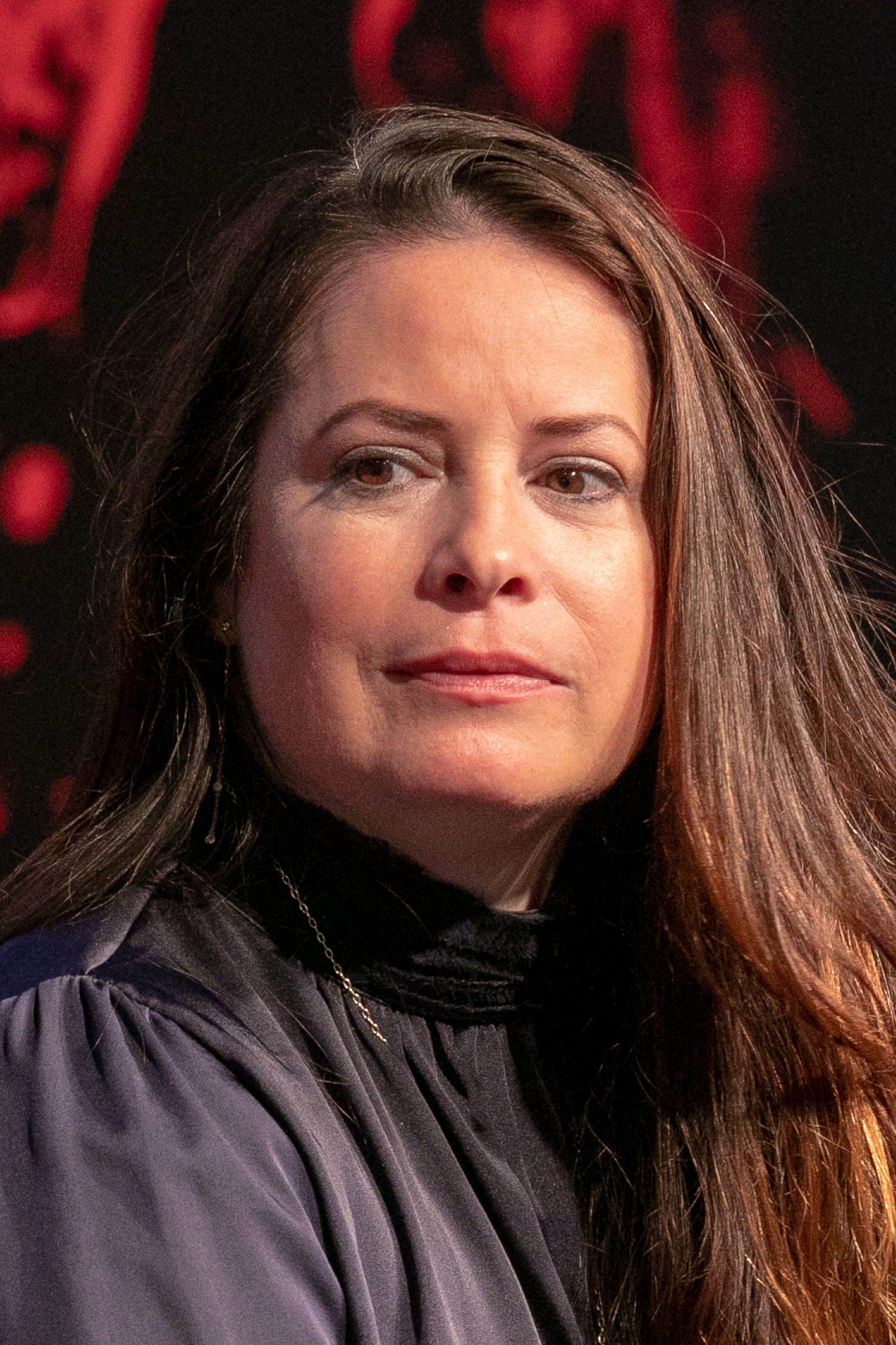 Holly Marie Combs at the "Charmed" conference during the Manga & Sci-Fi show on October 20, 2018, in Paris, France | Source: Getty Images