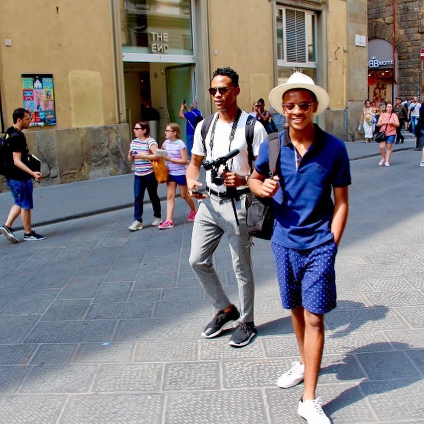 Blake Underwood walks beside his brother Paris Underwood on a busy city street, both appearing relaxed and in motion during a candid moment out together. | Source: Instagram/blairunderwood_official