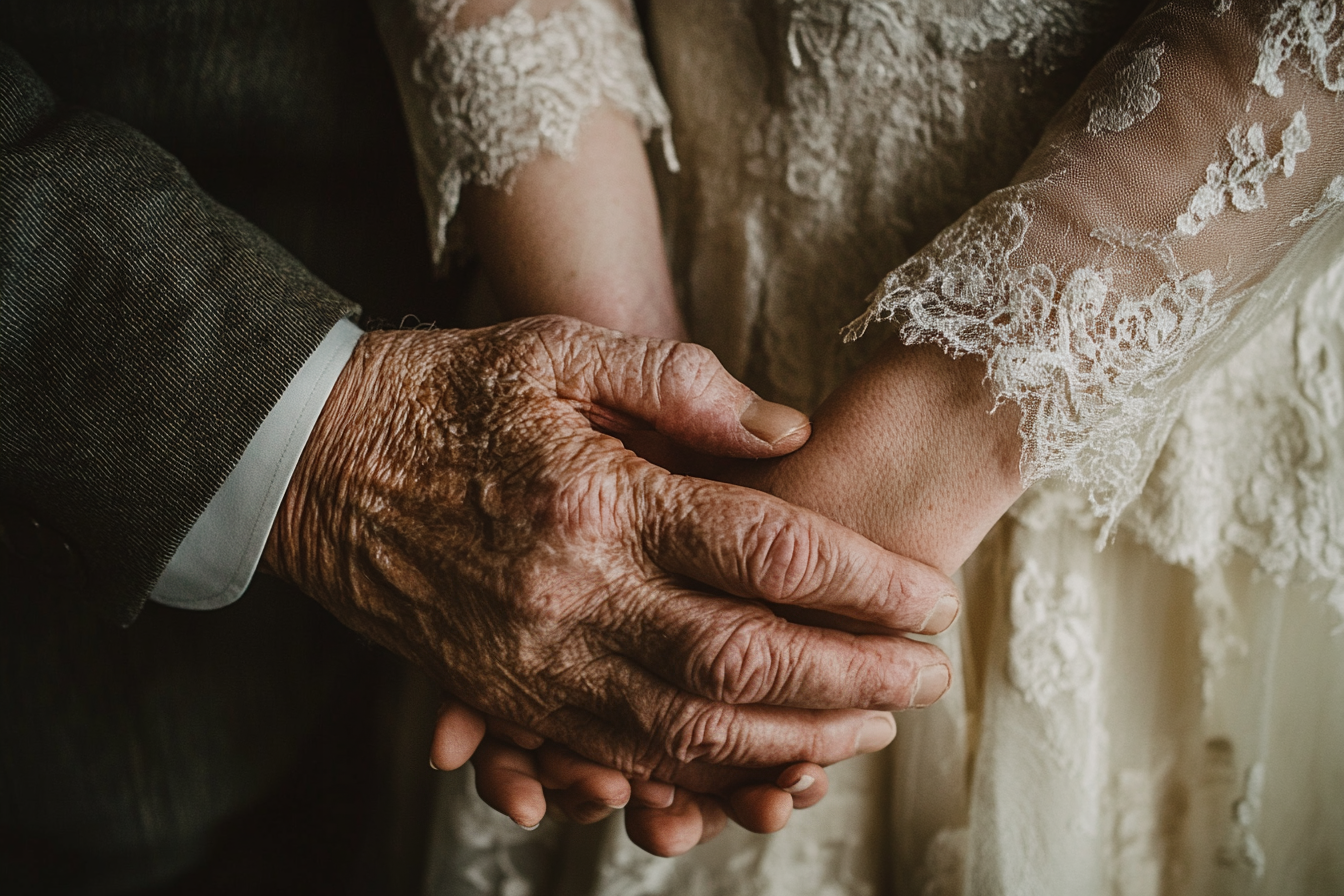 A man holding his daughter's hands | Source: Midjourney