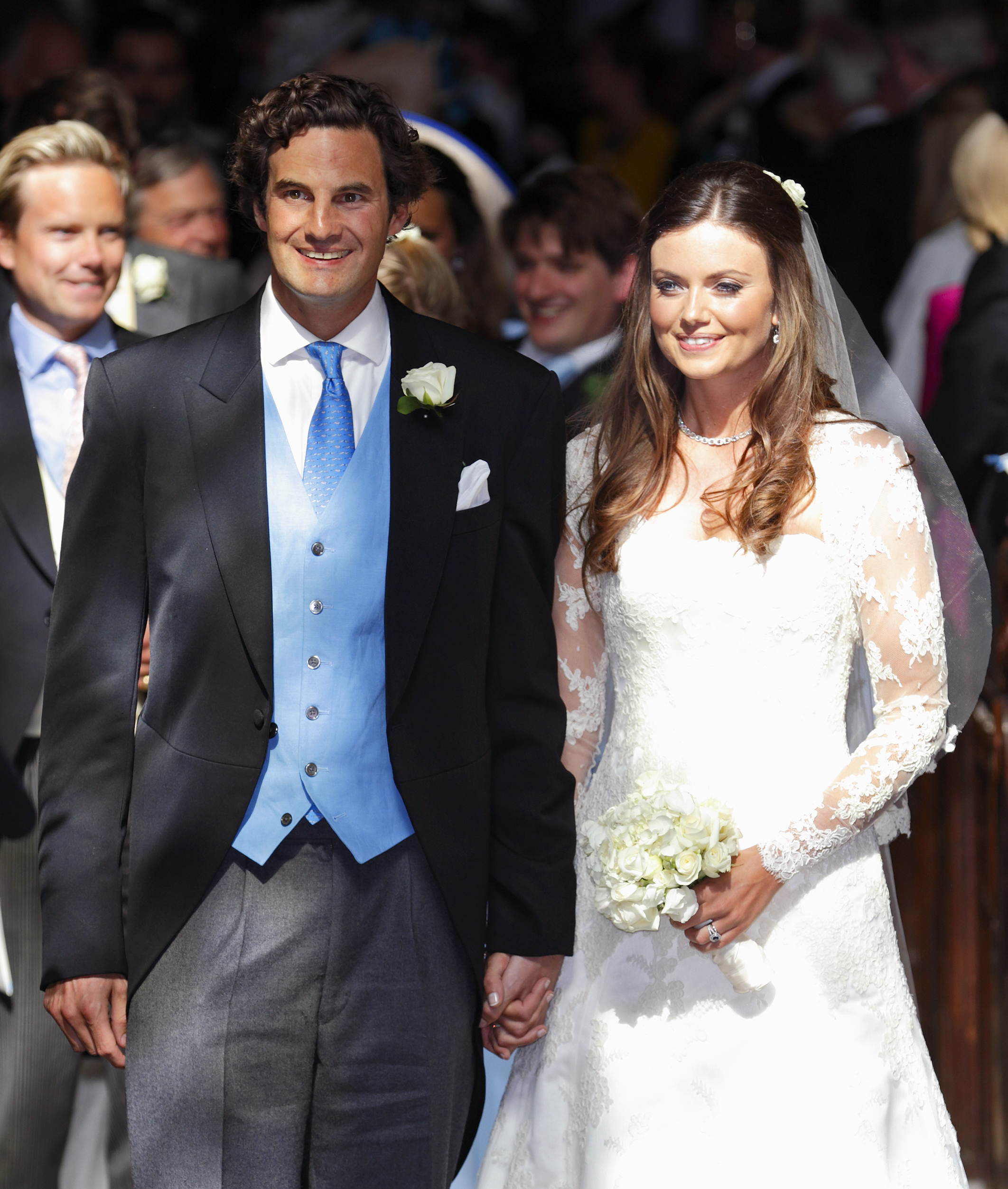 Rupert Finch and Lady Natasha Rufus Isaacs leave the church of St John the Baptist after their wedding on June 8, 2013 in Cirencester, England | Source: Getty Images