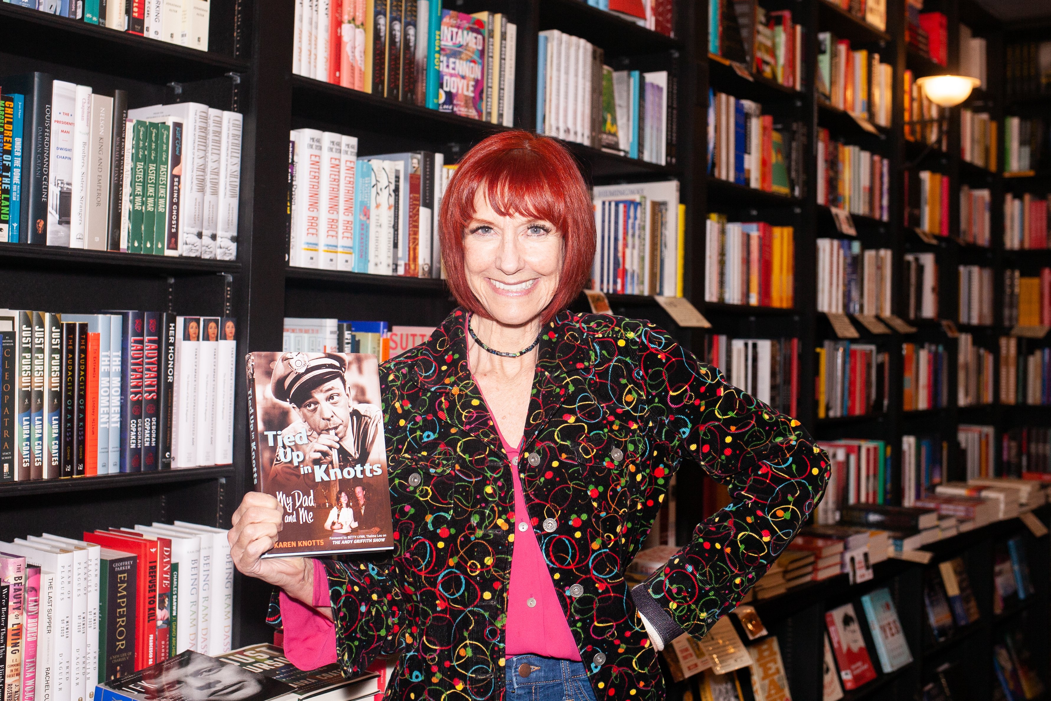Karen Knotts poses with her memoir "Tied Up in Knotts" at Book Soup on March 03, 2022 in West Hollywood, California. | Source: Getty Images