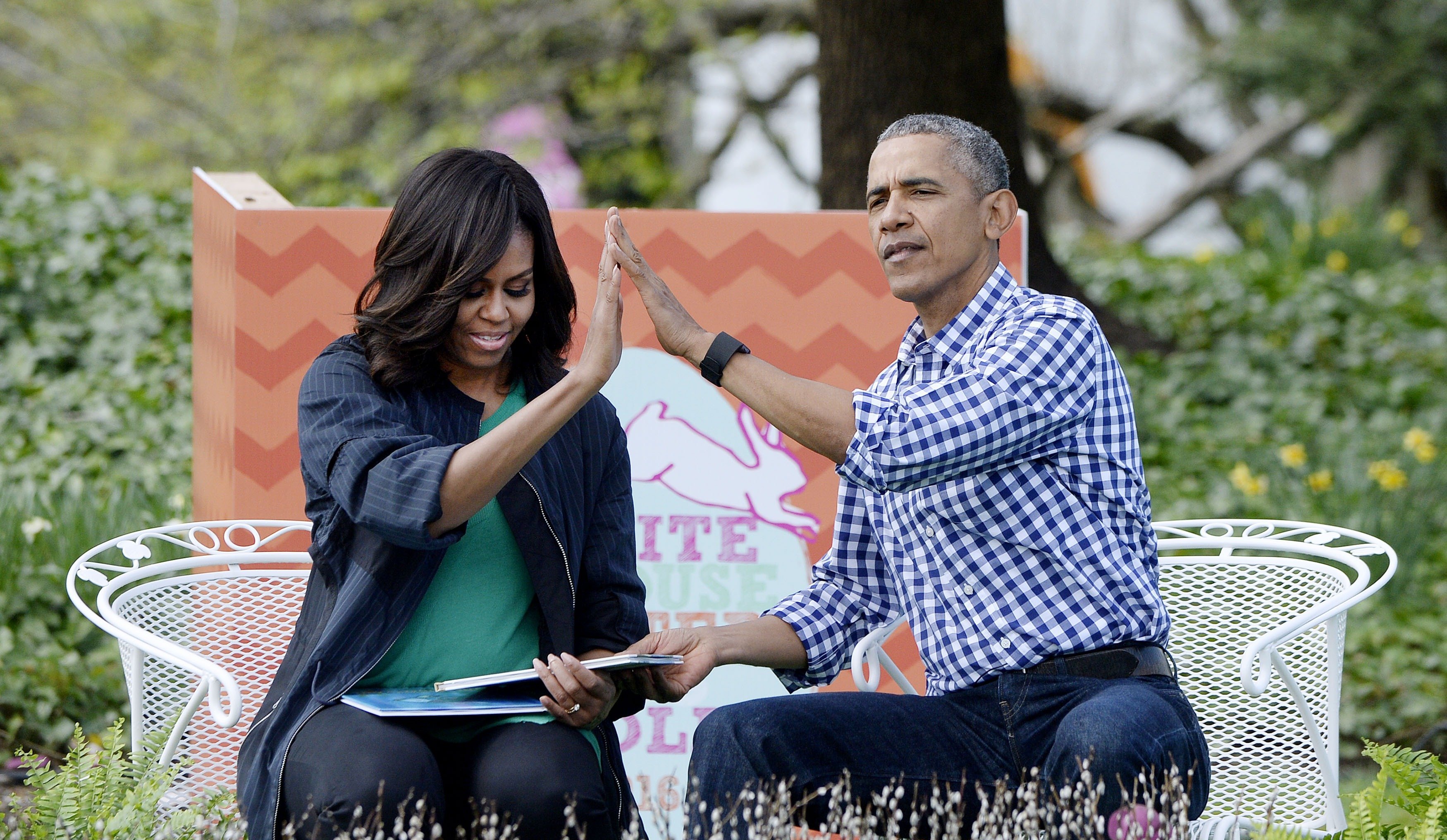 President Barack Obama and first lady Michelle Obama during the White House Easter Egg Roll on the South Lawn of the White House March 28, 2016, in Washington, DC.  | Source: Getty Images.