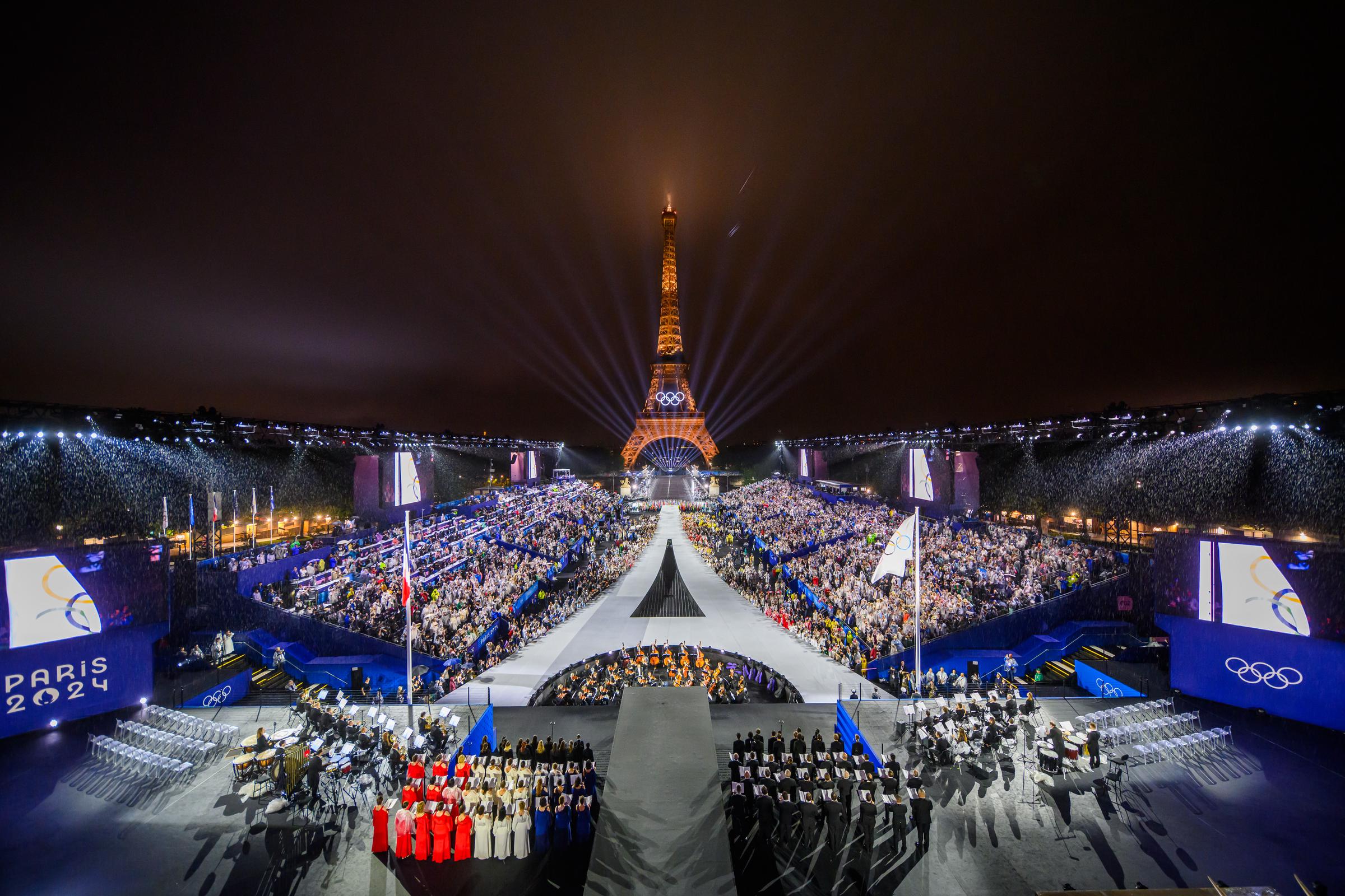 The Olympic flag is raised at the Place du Trocadéro in front of the Eiffel Tower during the Opening Ceremony of the Olympic Games Paris 2024 on July 26, 2024, in Paris, France | Source: Getty Images