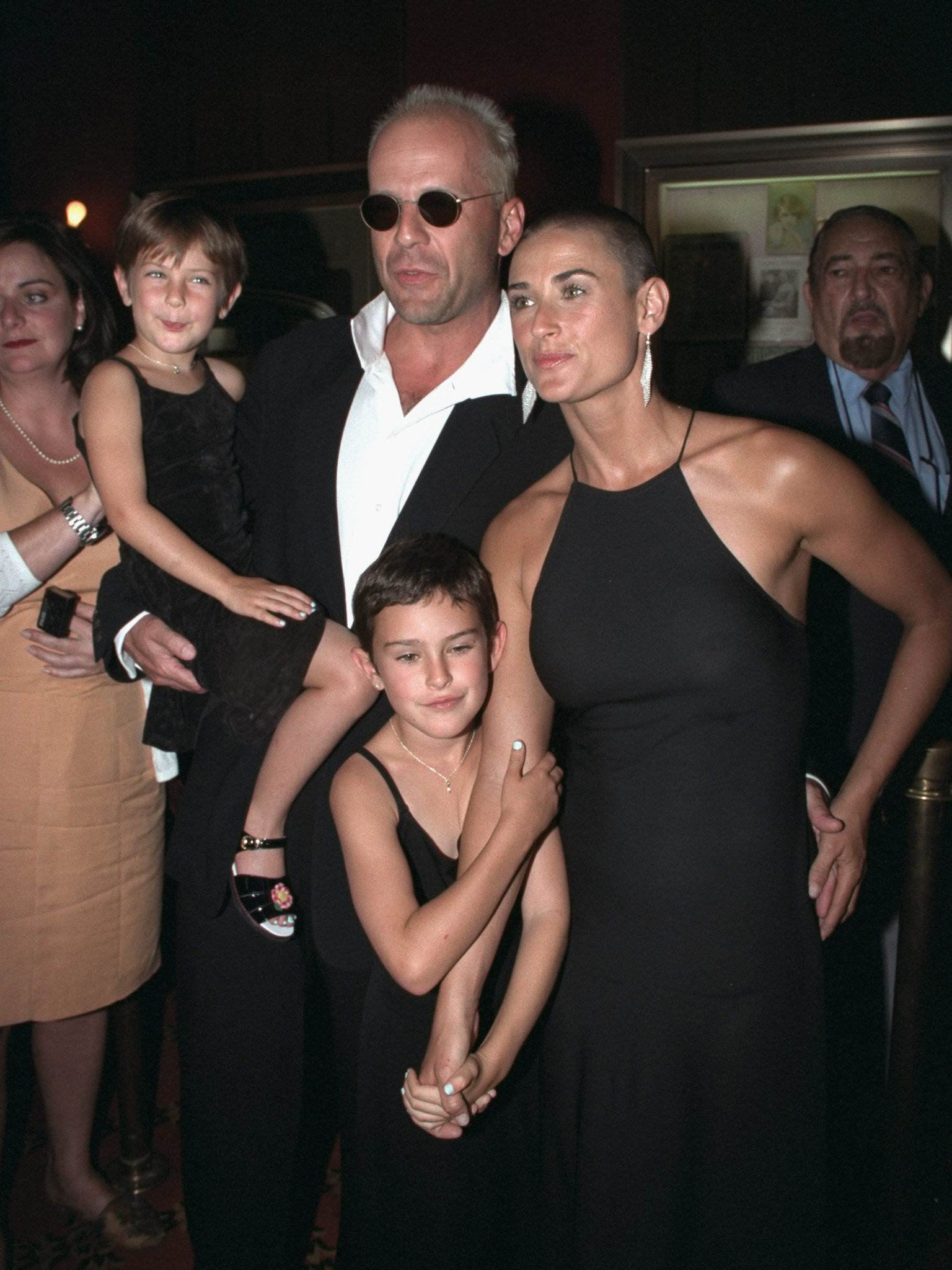 Demi Moore and Bruce Willis with daughters, Rumer and Scout, attending premiere of movie "Striptease" at the Ziegfeld Theater, on June 23, 1996. | Source: Getty Images