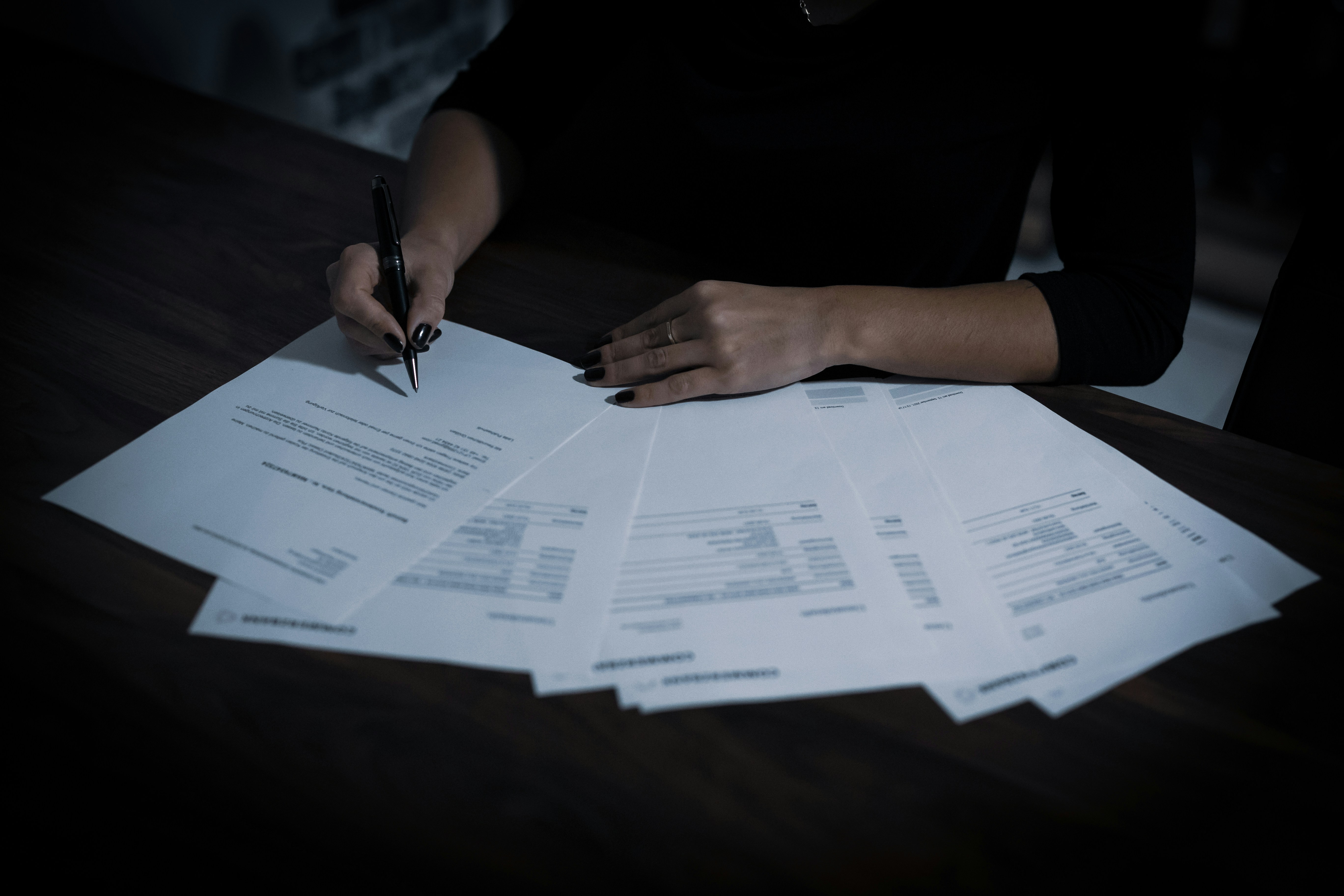 A woman going through reports | Source: Unsplash
