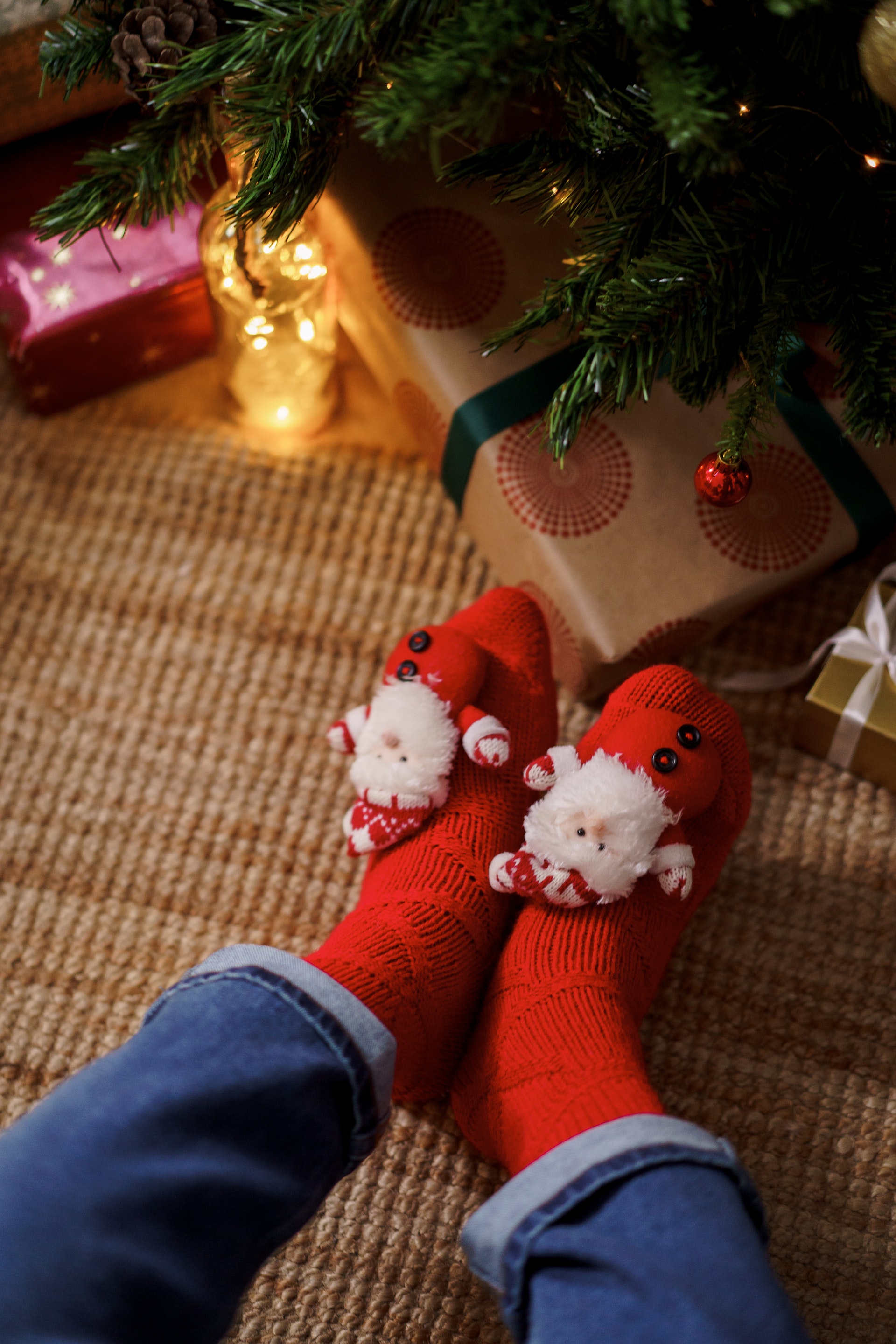 A person wearing Christmas-themed socks | Source: Pexels