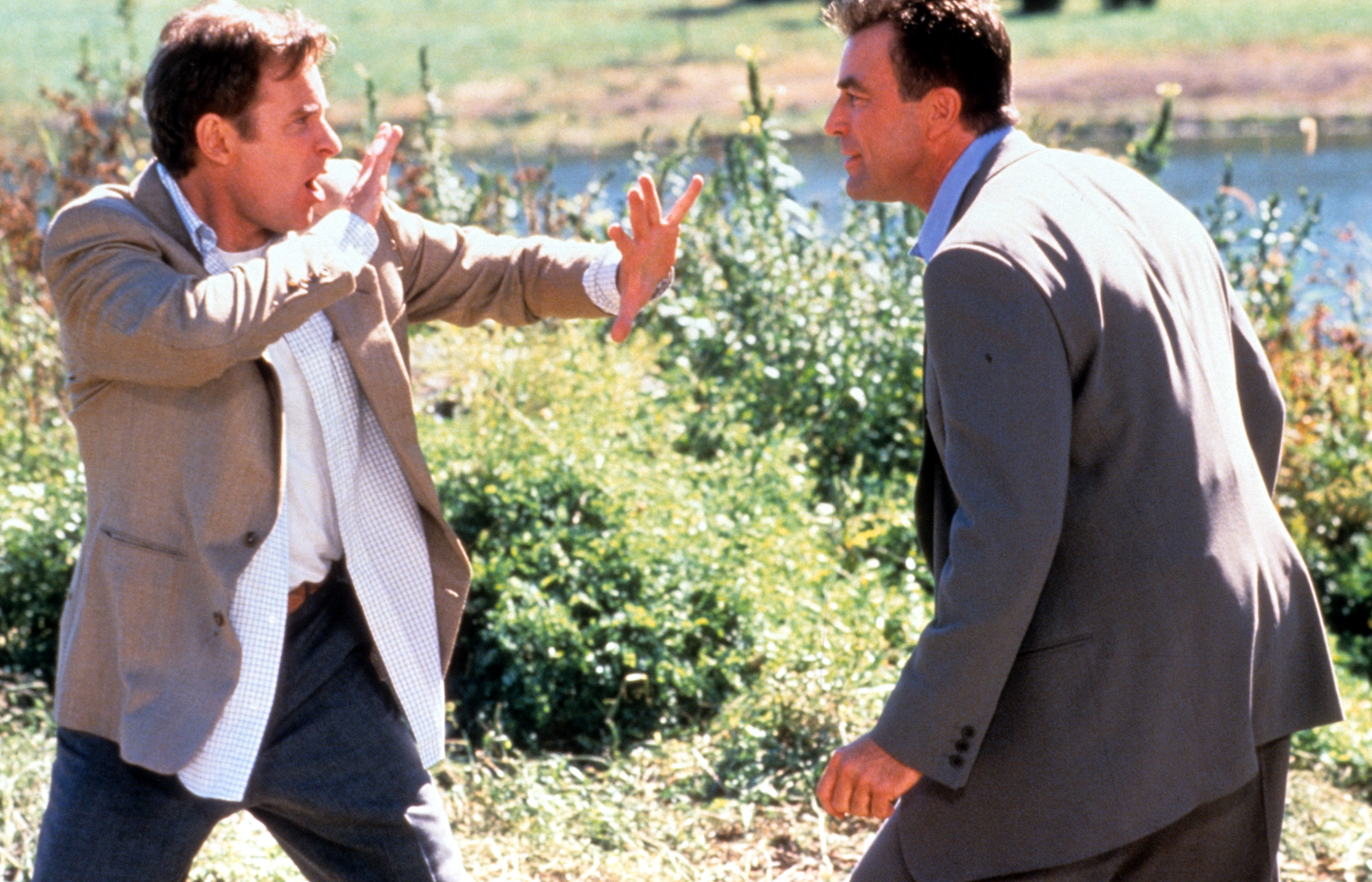 Kevin Kline and Tom Selleck on the set of "In & Out," 1997 | Source: Getty Images